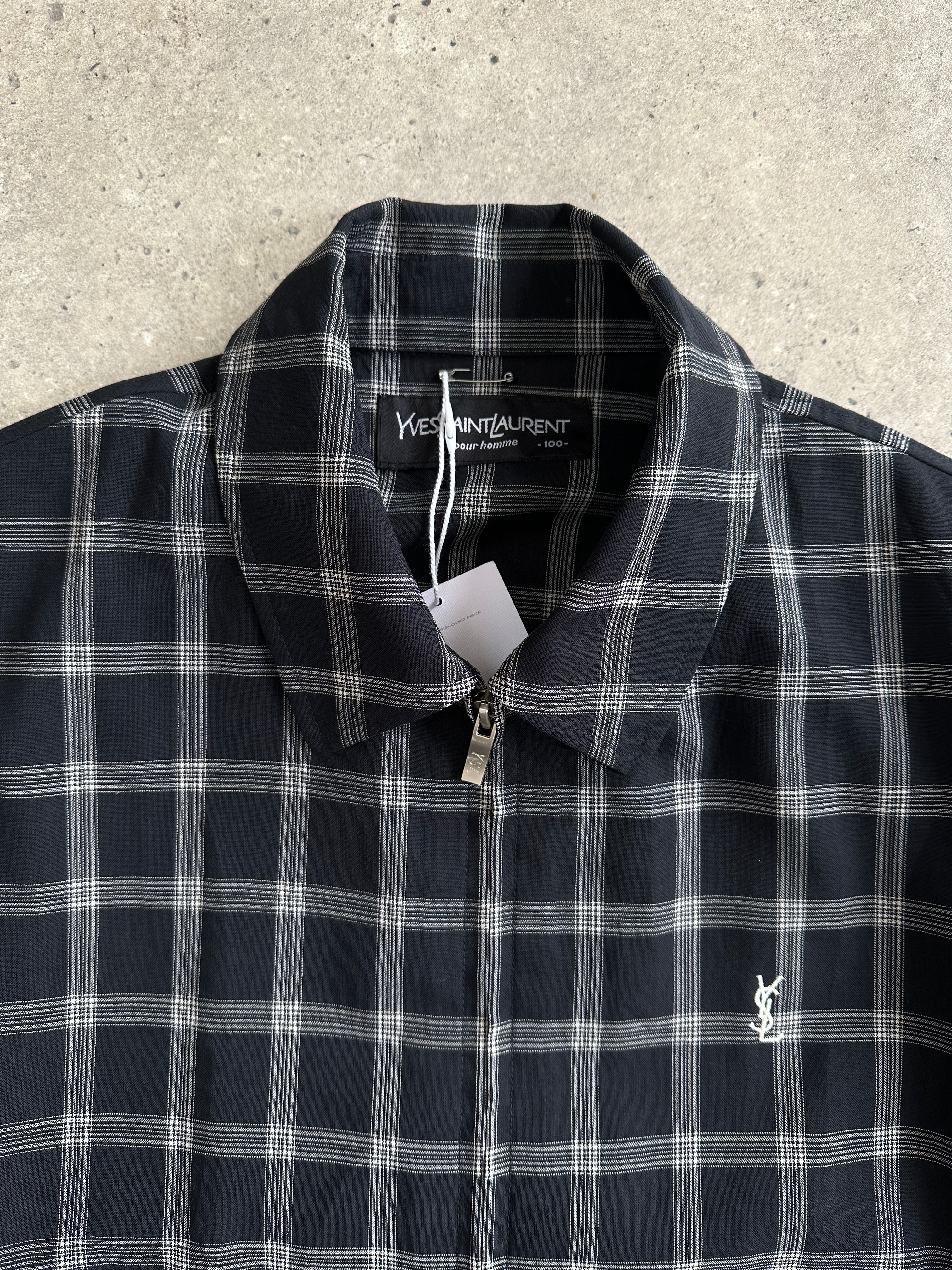 Yves Saint Laurent Pour Homme check logo bomber jacket in black with front zipper and ribbed cuffs, size M/L.