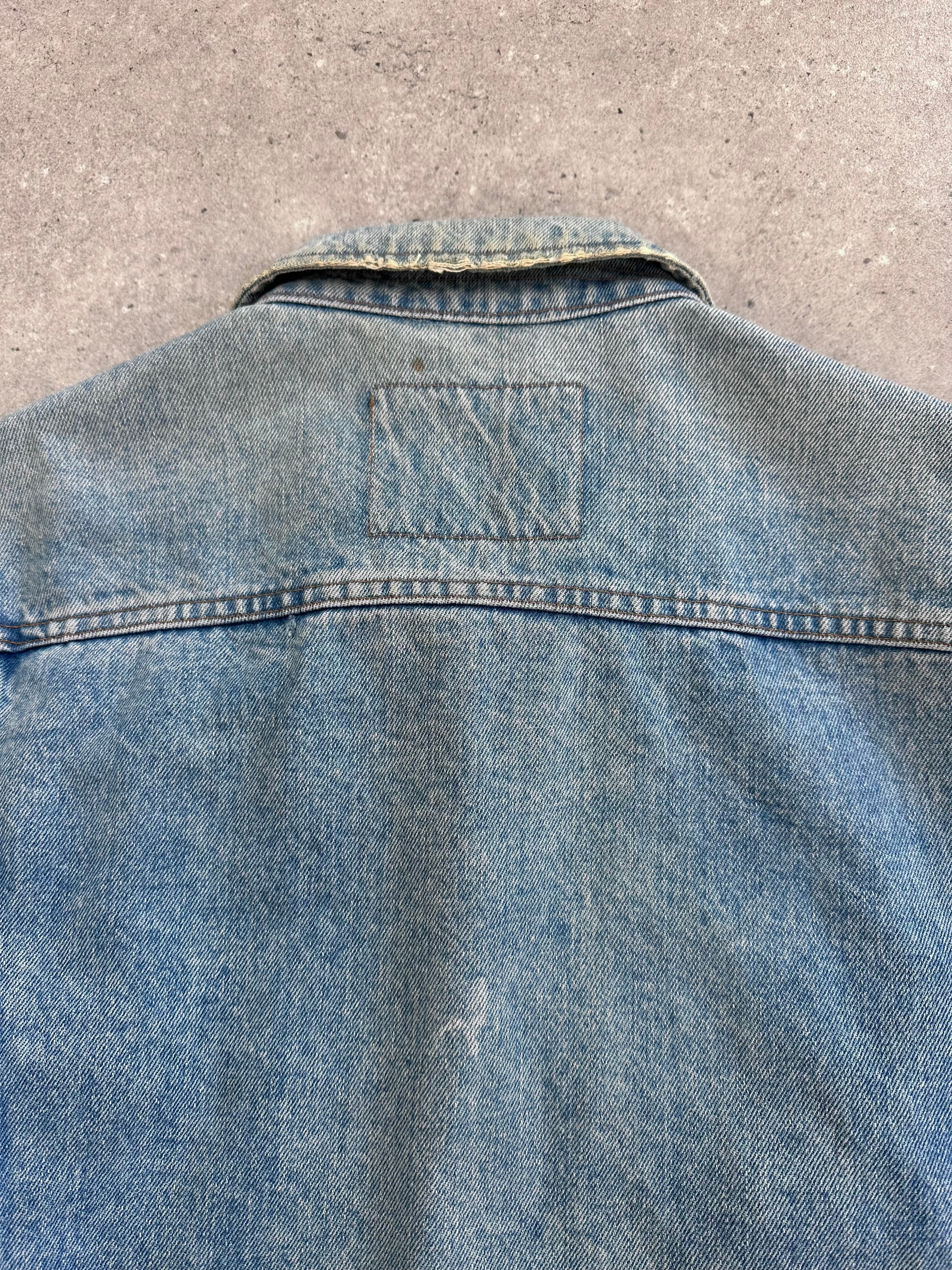 Valentino denim jacket in XL size showing classic blue denim fabric, button closure, and stylish fit.