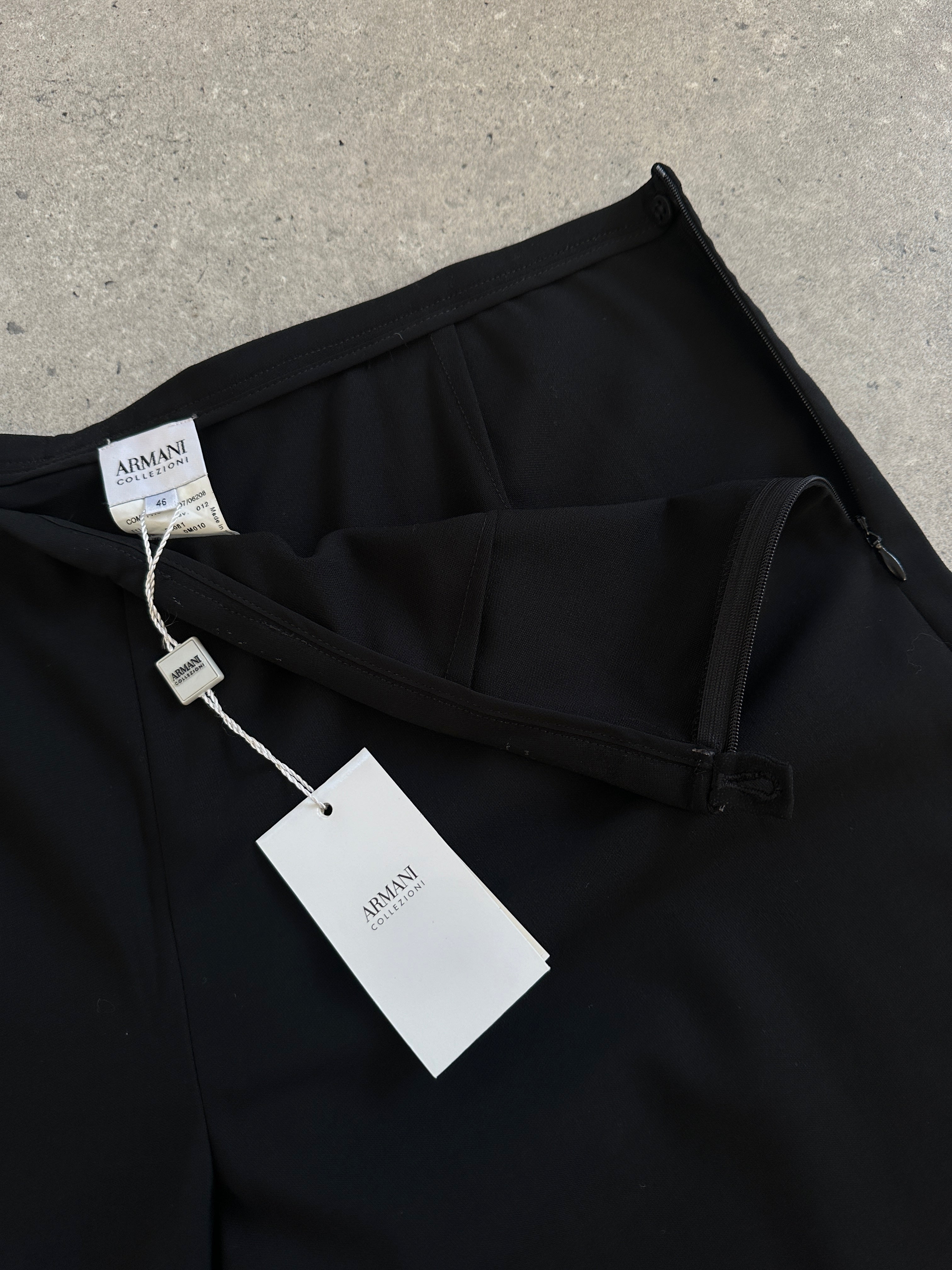 Armani Collezioni 2000s pure wool wide-leg tailored trousers in size W32, shown on a hanger with a neutral background.