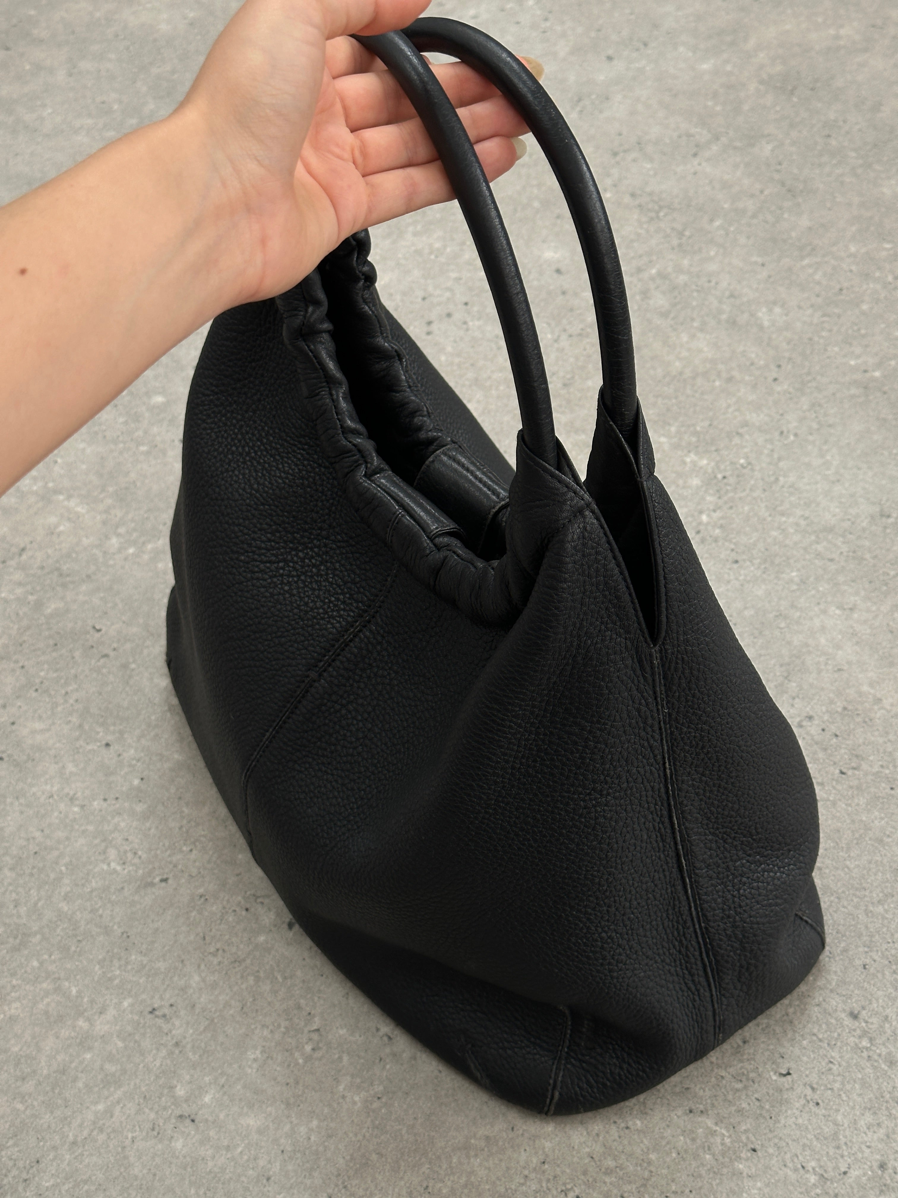 Giorgio Armani 2000s leather hobo shoulder bag with sleek design and top handle, crafted from high-quality leather.