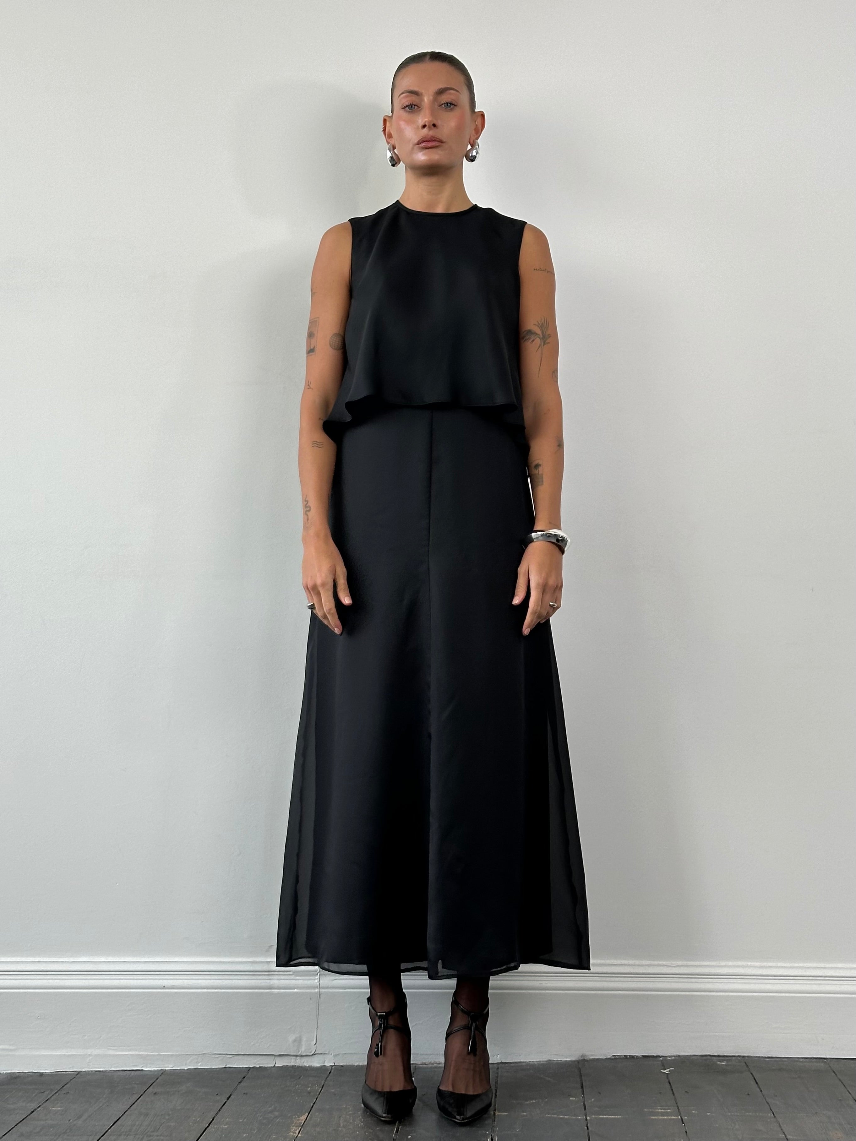 Vintage 1990s double-layered maxi dress in S/M, featuring flowing fabric and retro style, perfect for vintage fashion enthusiasts.