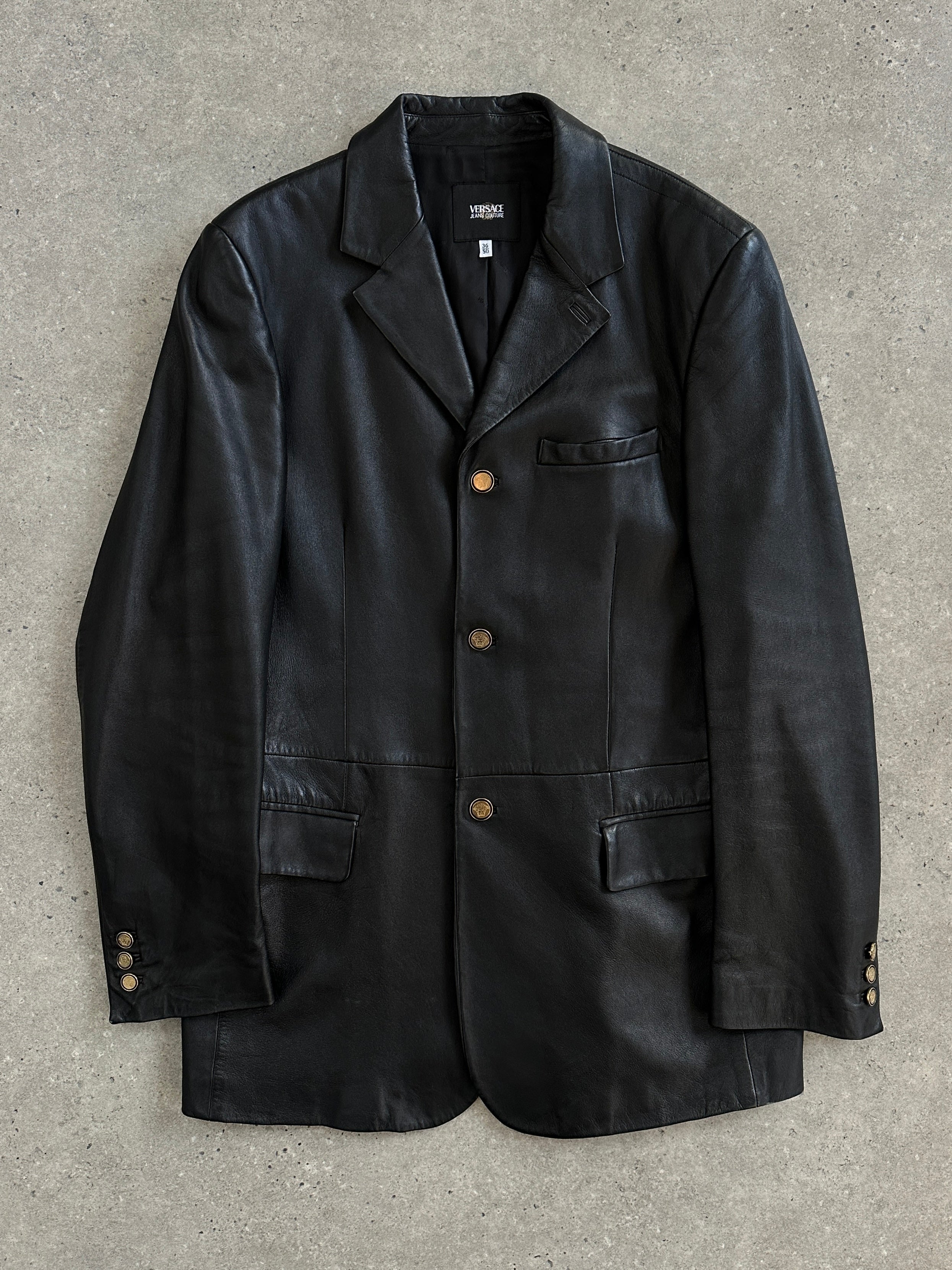 Versace Jeans Couture 1990s bespoke leather blazer jacket, front view showing tailored fit, classic collar, and button details.