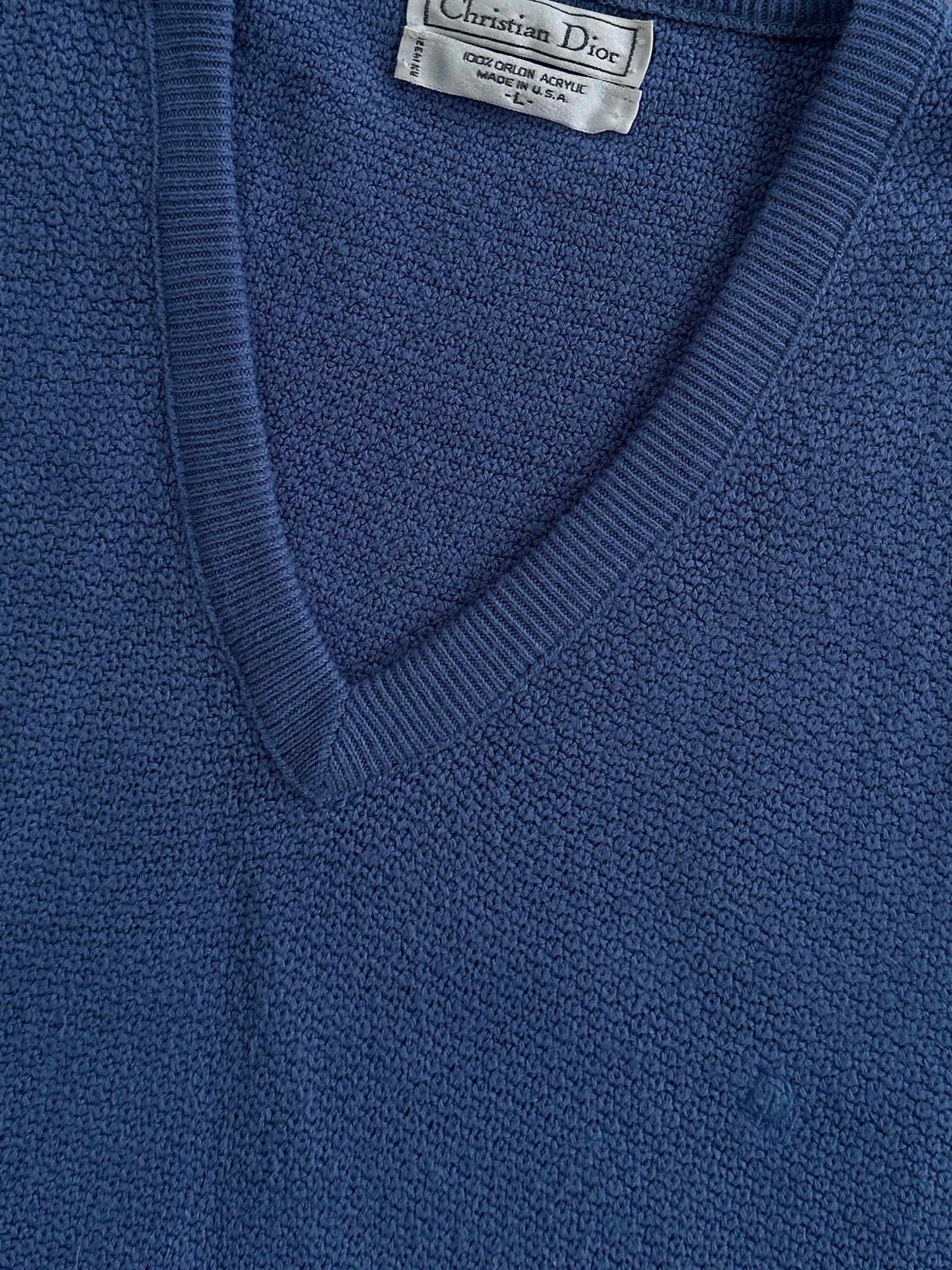 Christian Dior 1980s V-neck knitted logo jumper in size large, featuring a classic design with the Dior logo on the front.