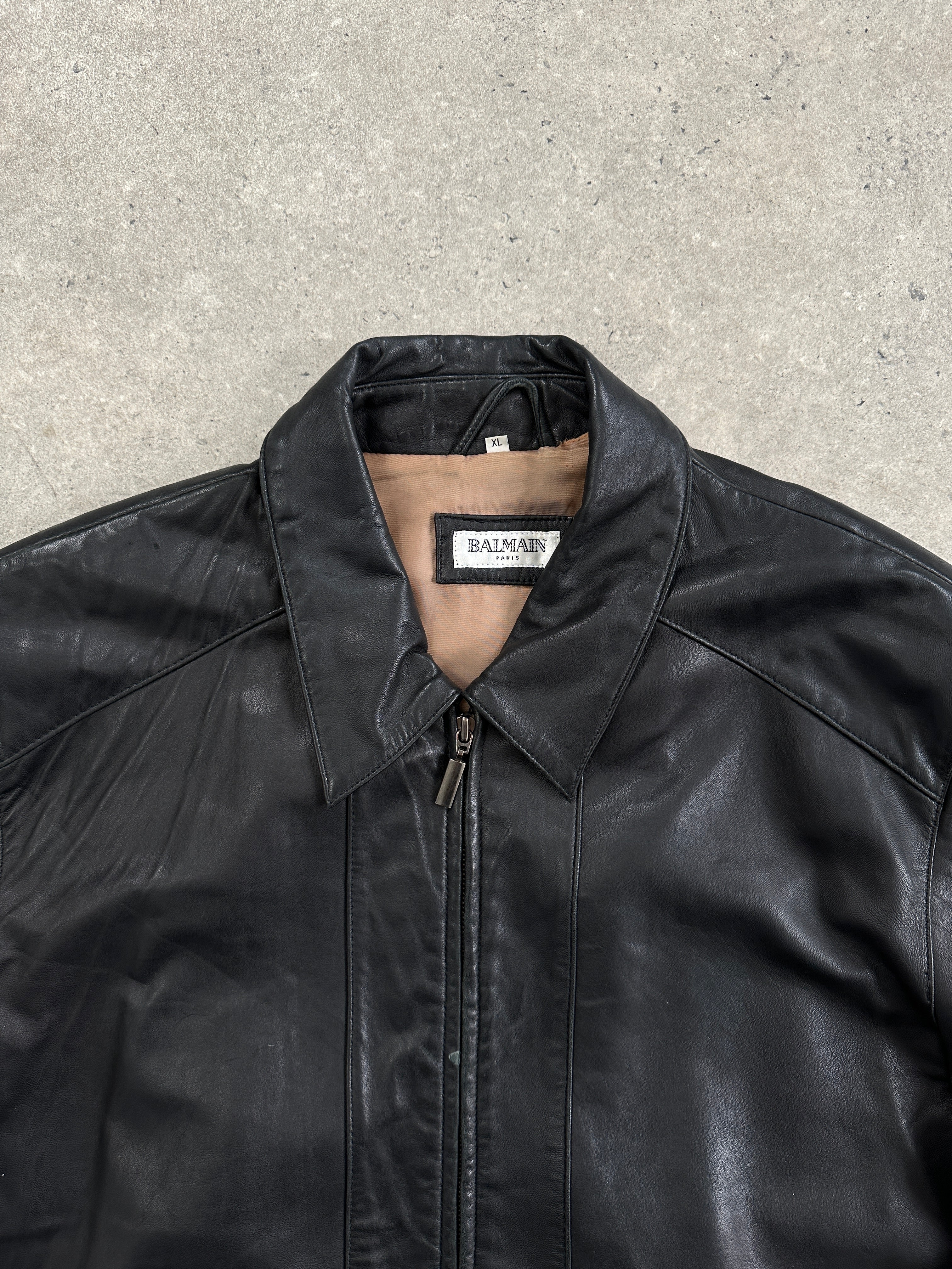 Balmain smooth leather jacket in XL size featuring sleek black leather with a classic collar and zip closure.