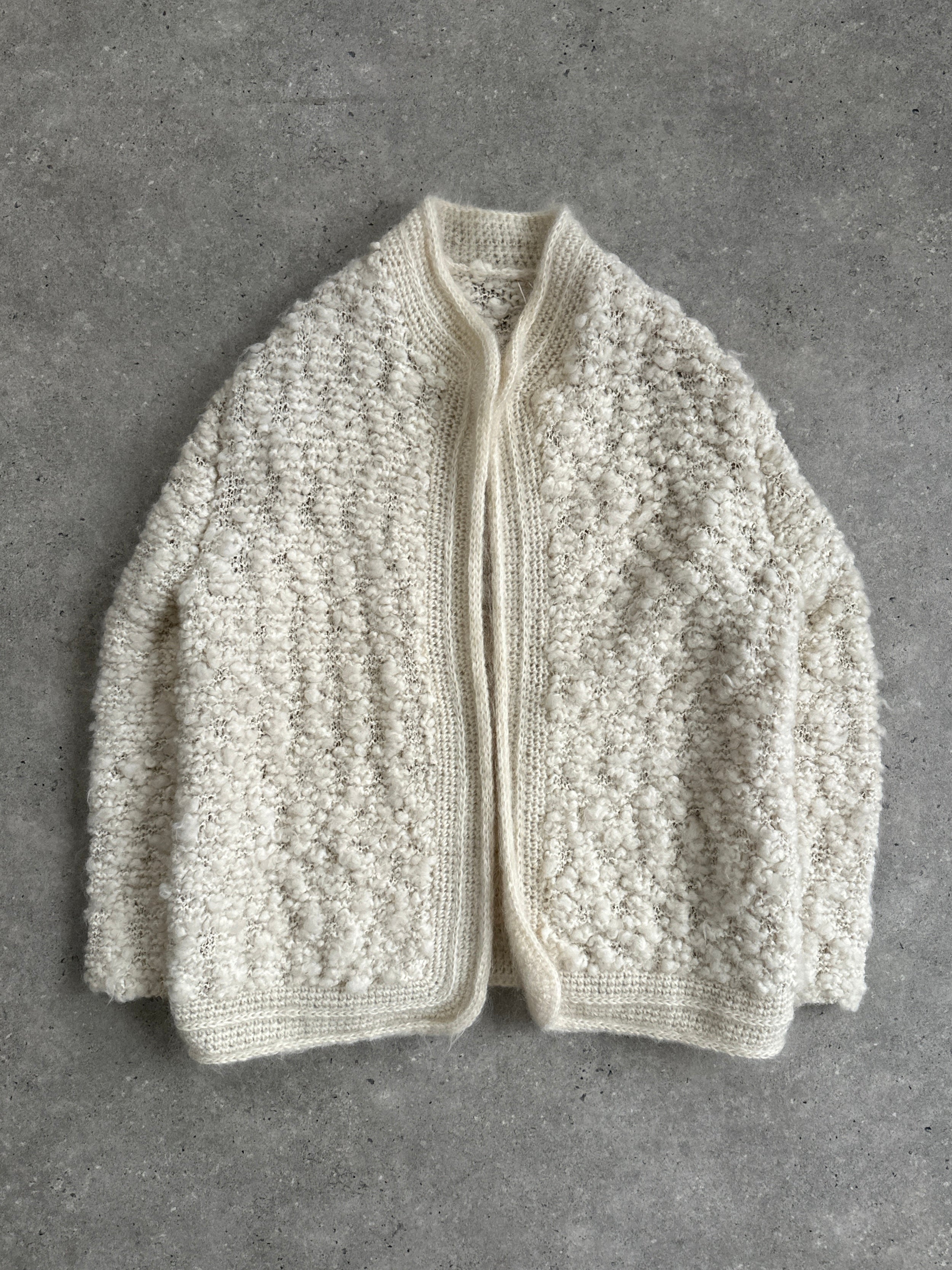 Vintage wool and mohair knitted cardigan in XL, featuring a cozy, textured knit pattern and classic design.