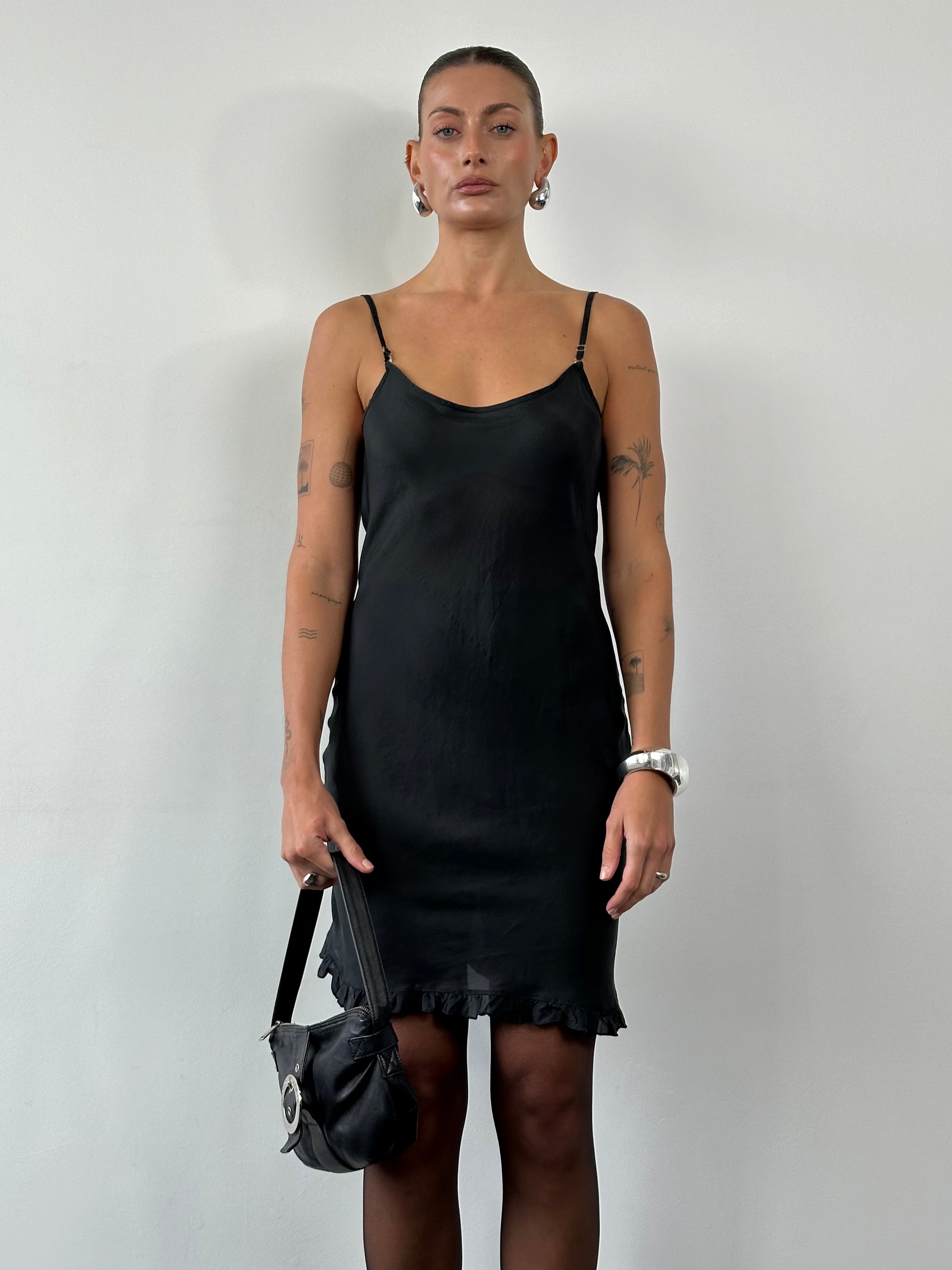 Vintage Italian vintage pure silk sheer mini slip dress in size S, lightweight and elegant with delicate fabric and minimal design.