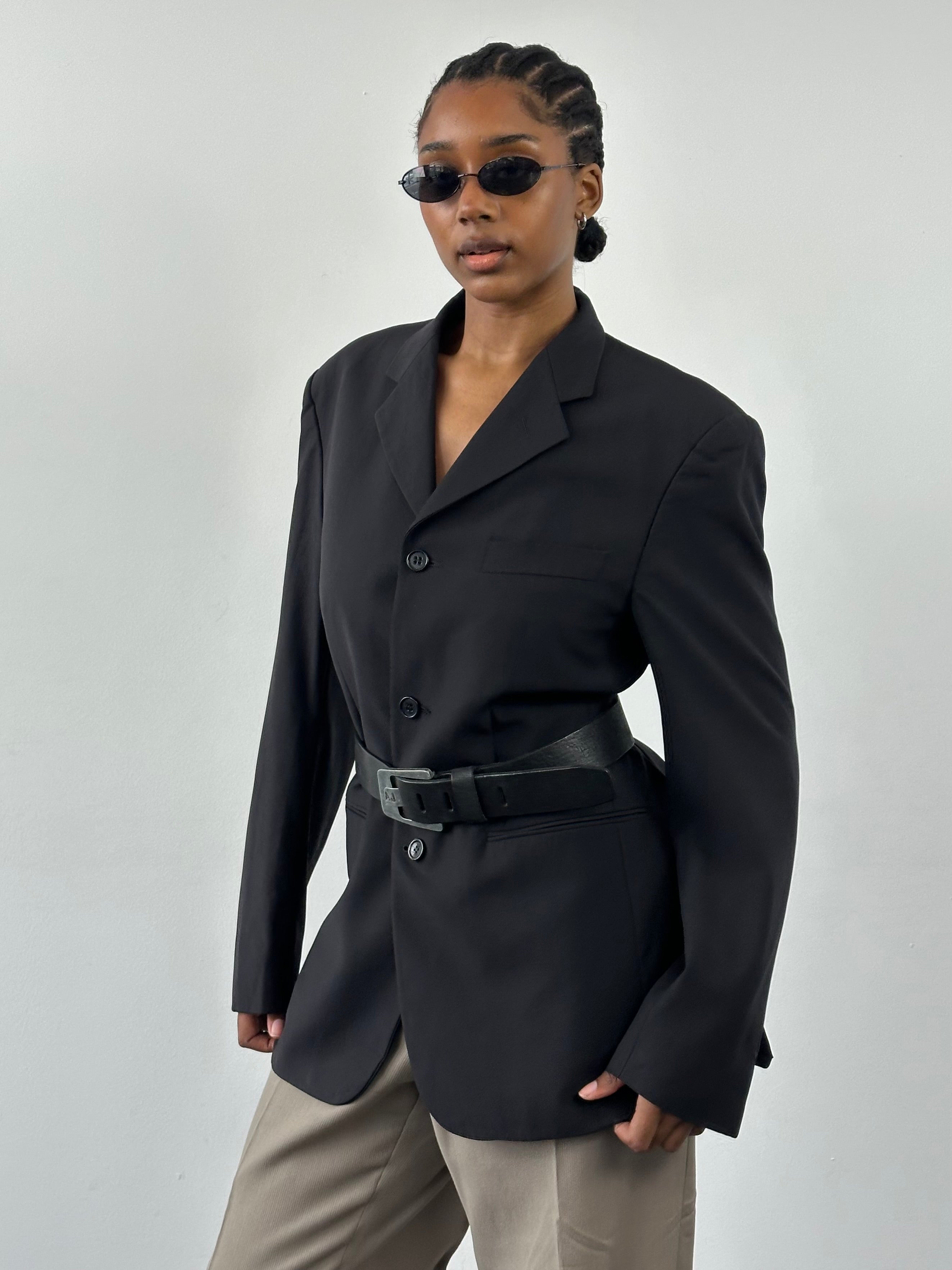 Yves Saint Laurent Pour Homme 1990s pure wool blazer in size 40R/L, tailored fit with classic lapel and button closure.