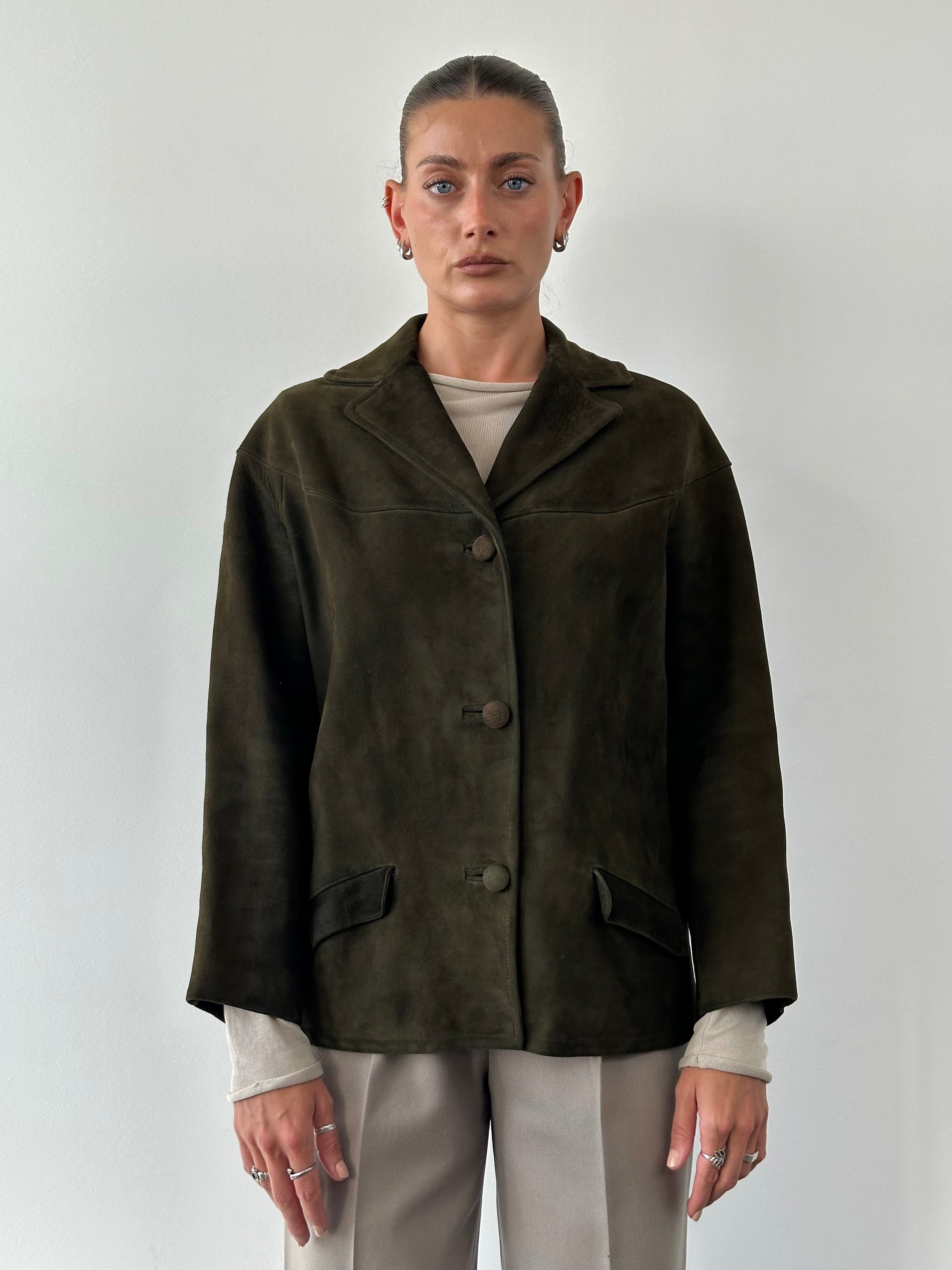 Vintage suede blazer jacket in size M, featuring classic design and tailored fit, displayed on a neutral background.