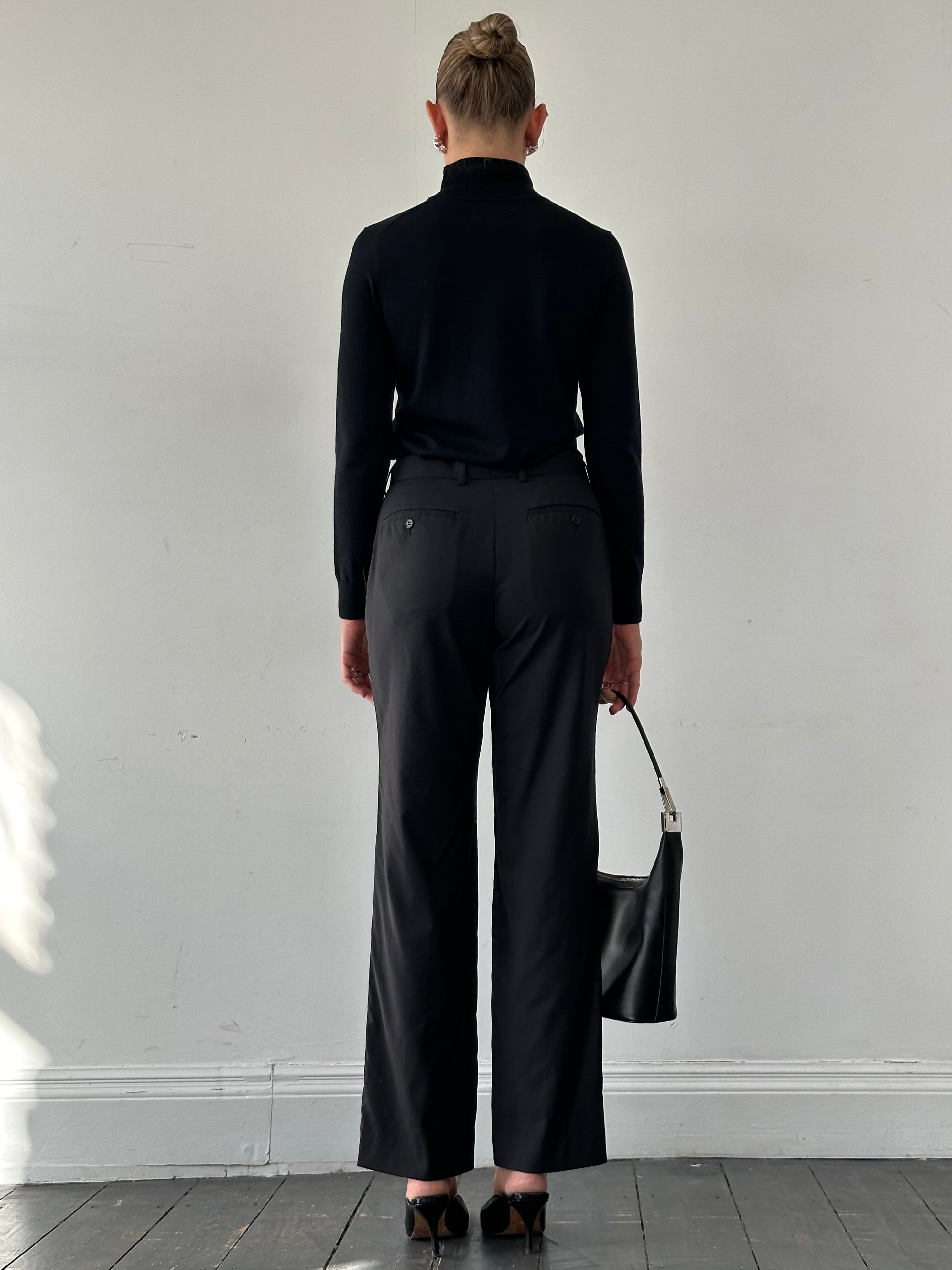 Vintage wool high-waisted straight leg tailored trousers in W30, showing classic fit and textured fabric.