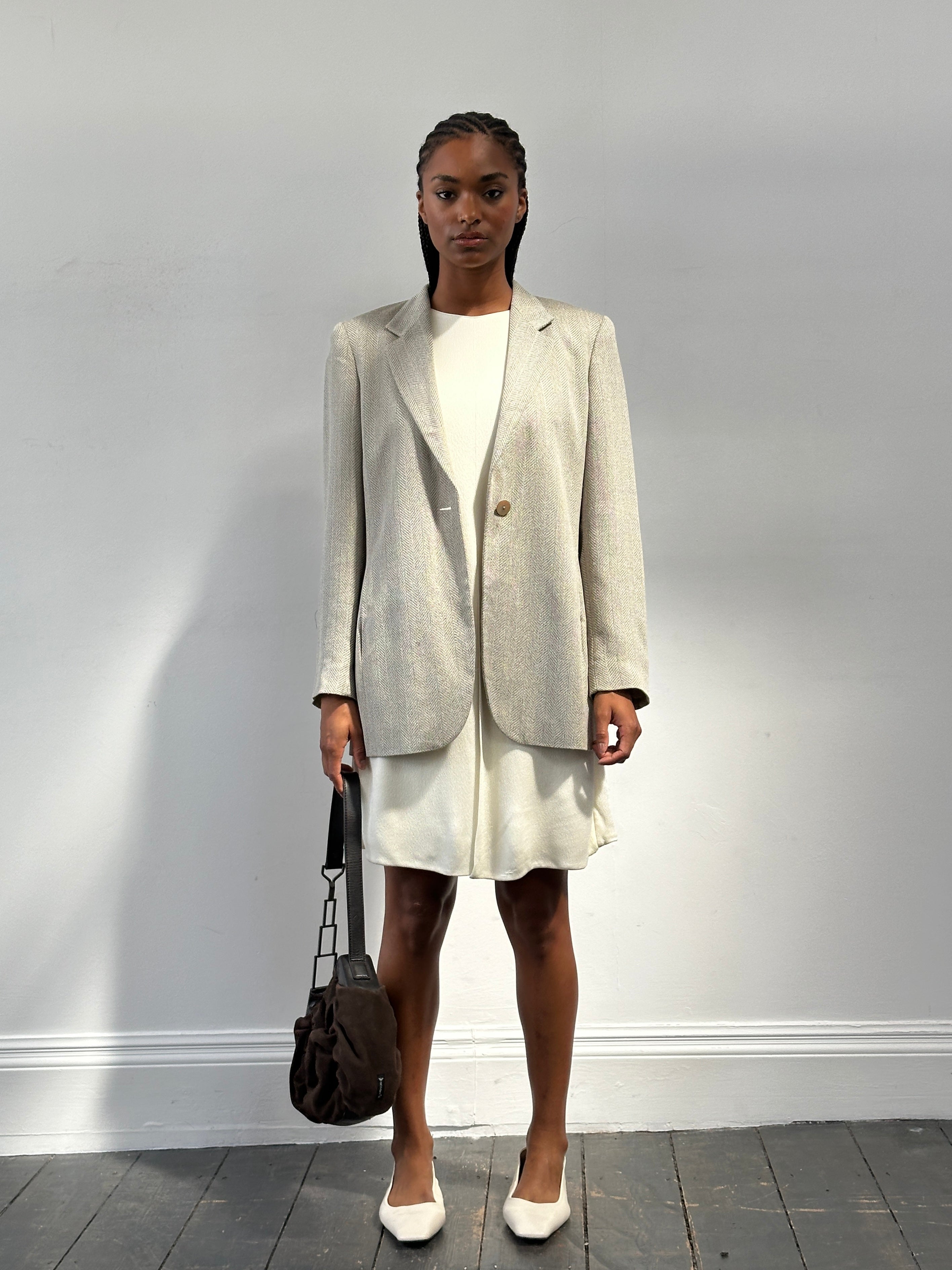 Max Mara relaxed single-button herringbone blazer in neutral tones, tailored fit with notch lapel and front pockets.
