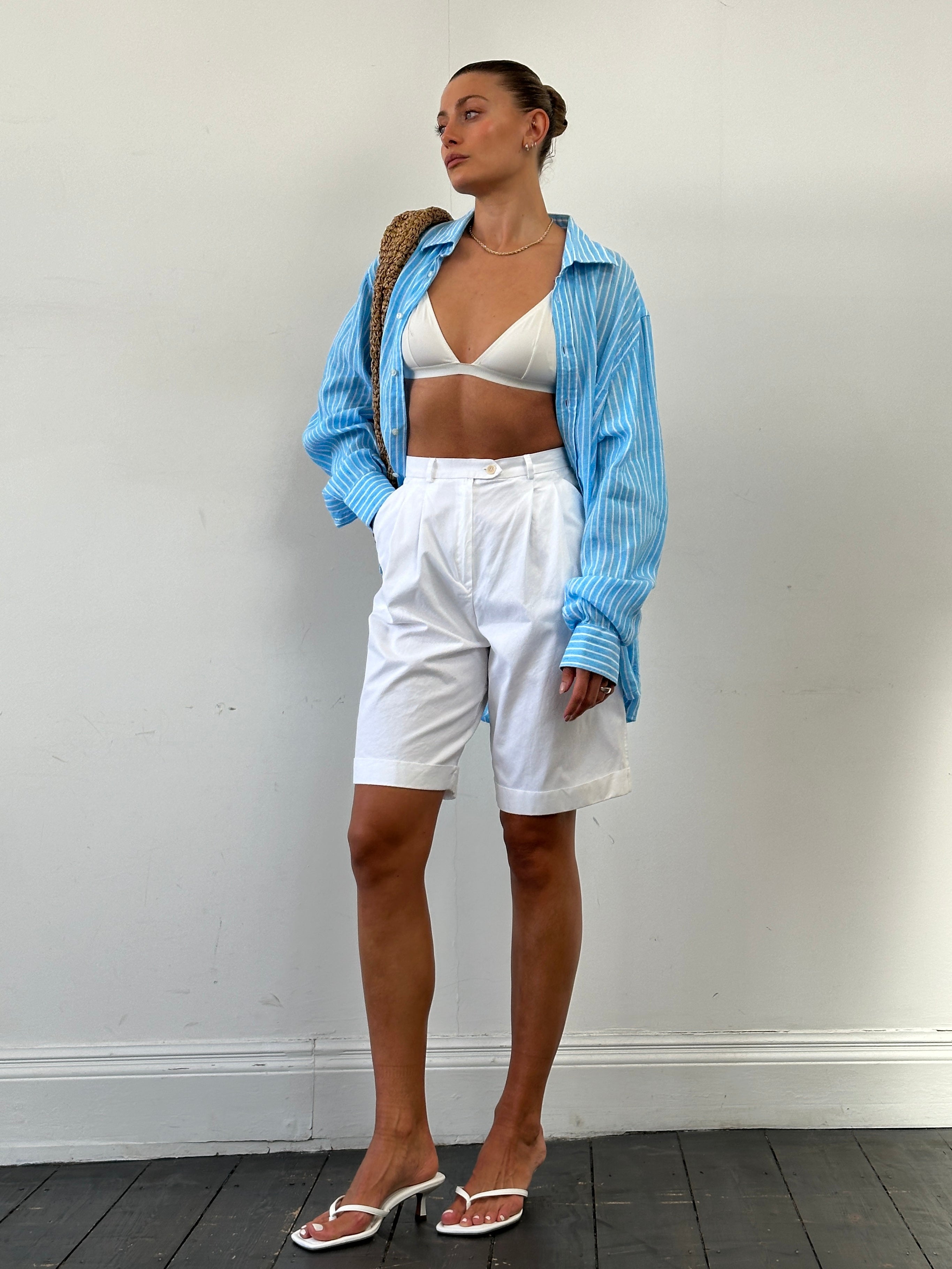 Max Mara high-waisted cotton Bermuda shorts in white, front view showing tailored fit and clean design.