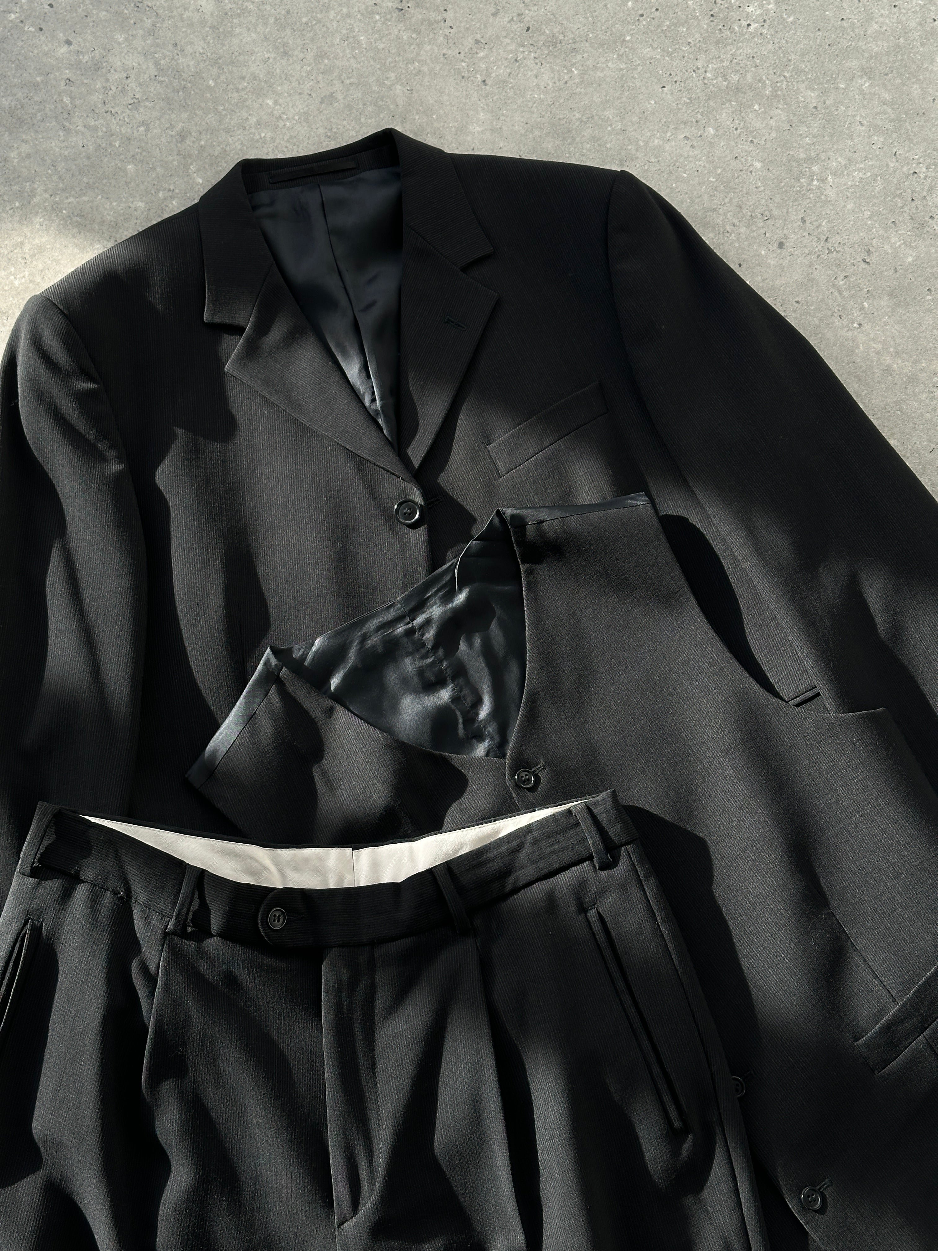 Pierre Cardin pinstripe wool three-piece suit in size 40S, featuring a jacket, vest, and trousers, tailored for a classic fit.