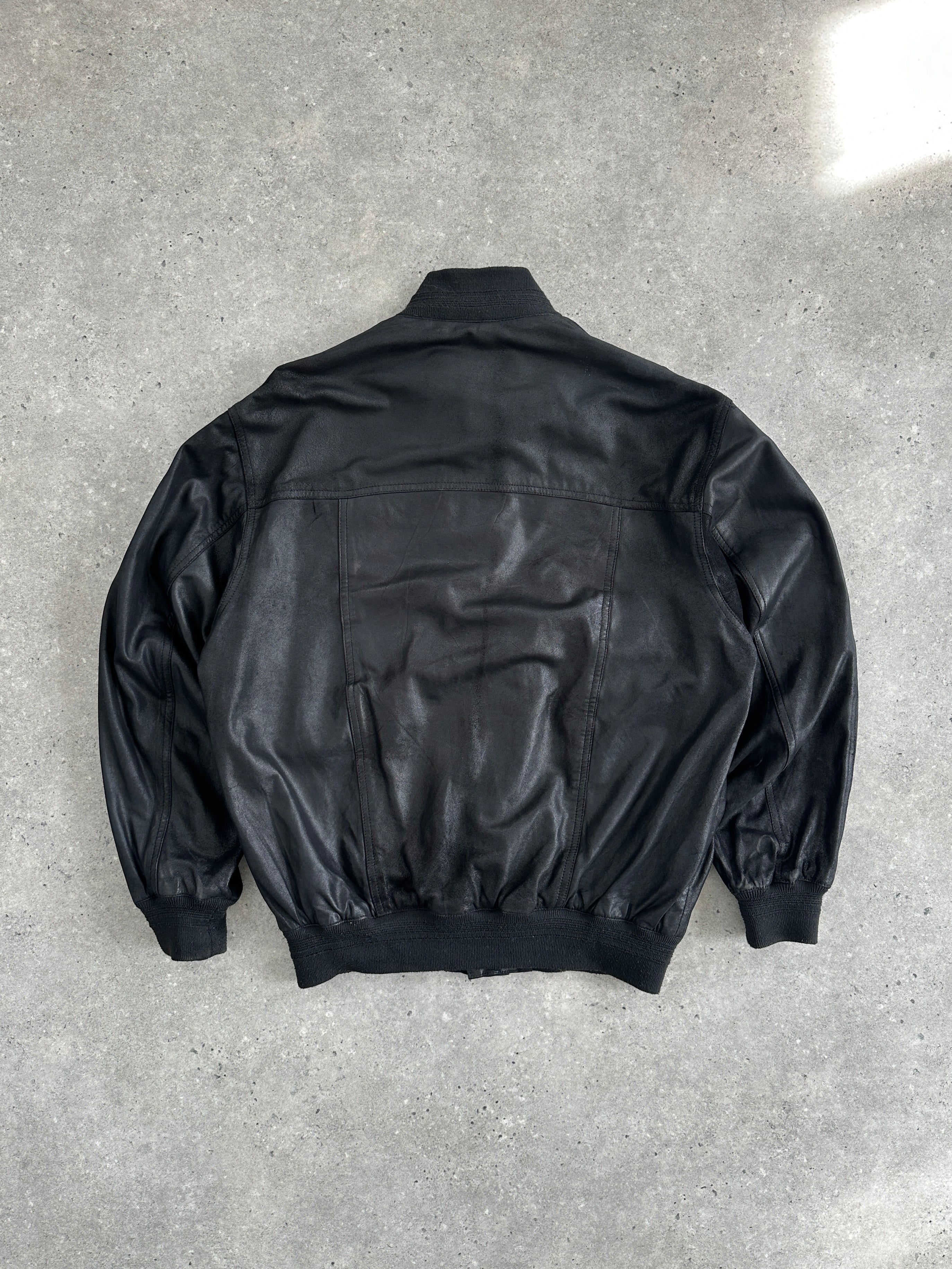 Vintage Italian 1990s leather nubuck bomber jacket, M/L size, featuring classic style and detailed stitching.