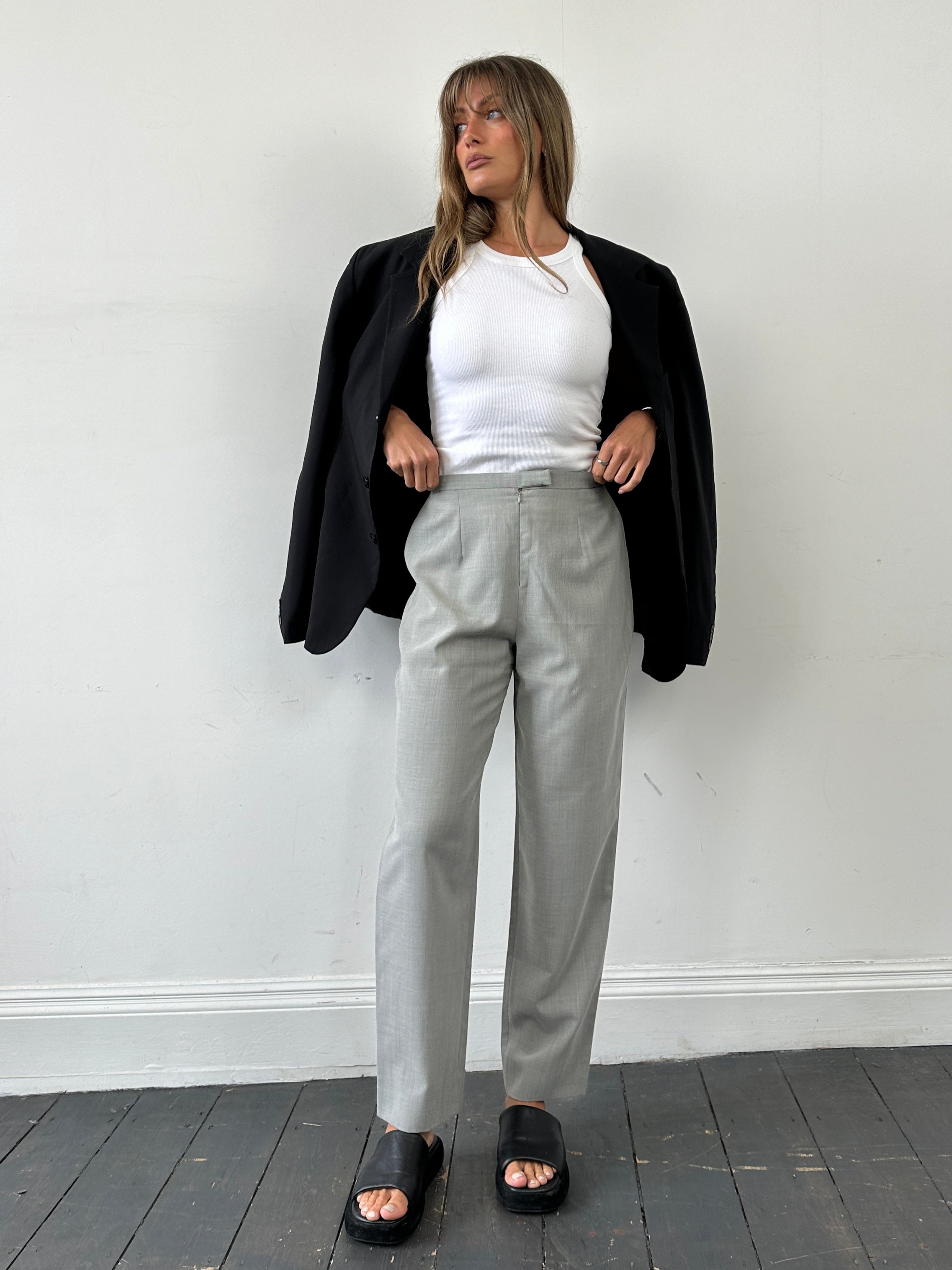 Marella wool blend high-waisted tapered leg trousers in dark color, front view showing fit and fabric texture.