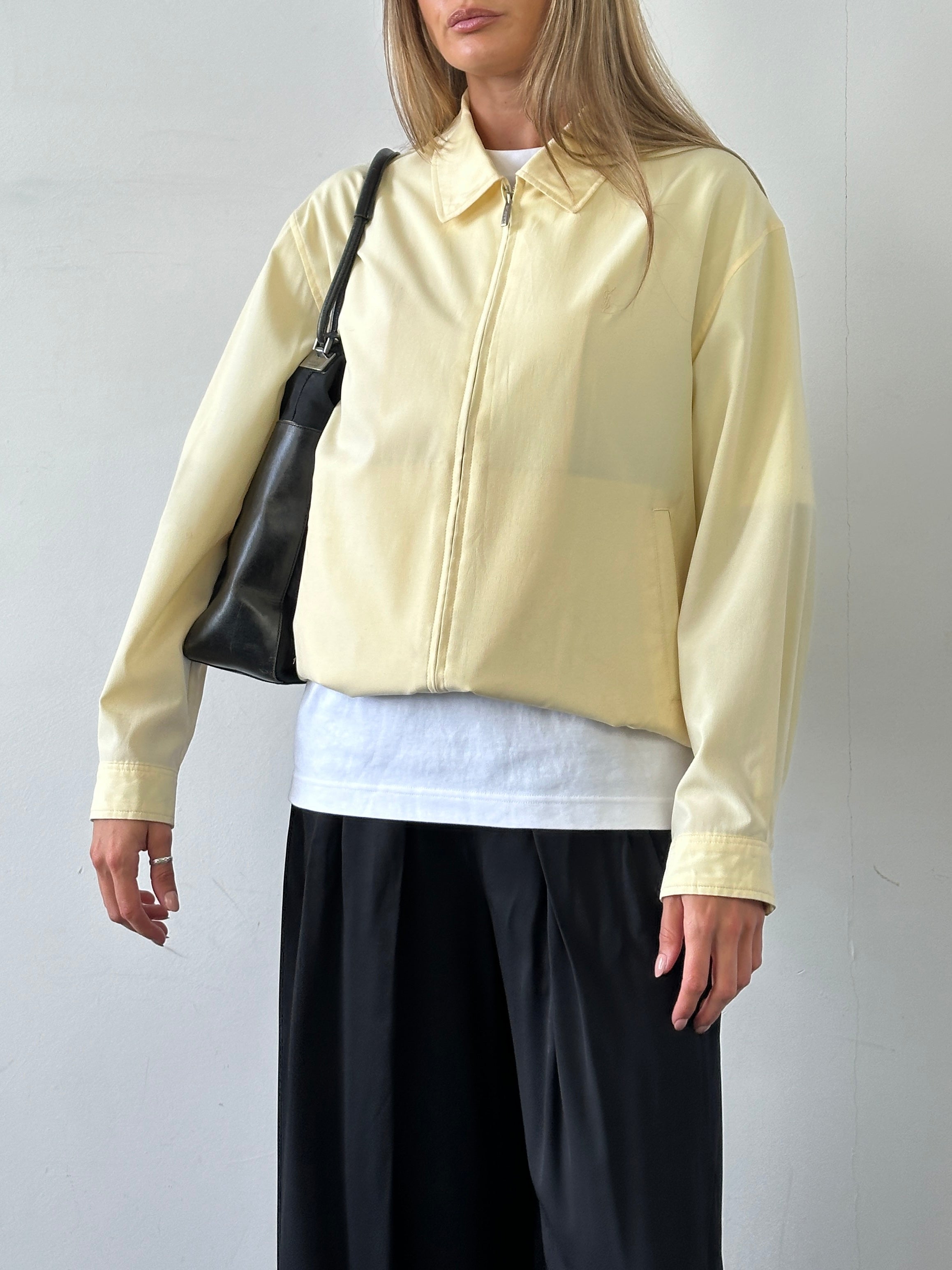 Yves Saint Laurent Pour Homme logo bomber jacket in size L, black with YSL branding on the chest and classic bomber style.