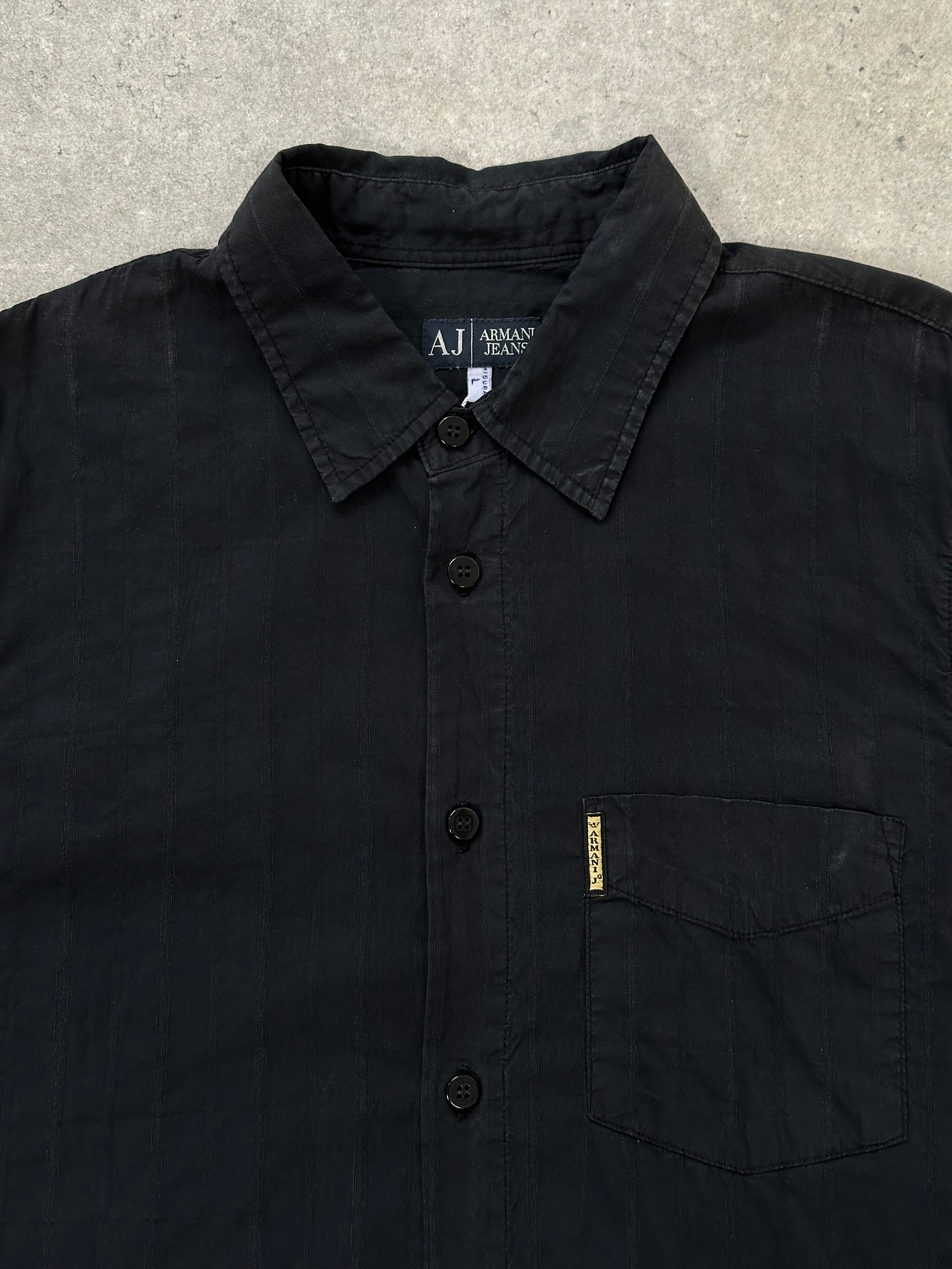 Armani Jeans 1990s cotton logo shirt in size M, featuring the classic Armani branding and a casual button-up design.