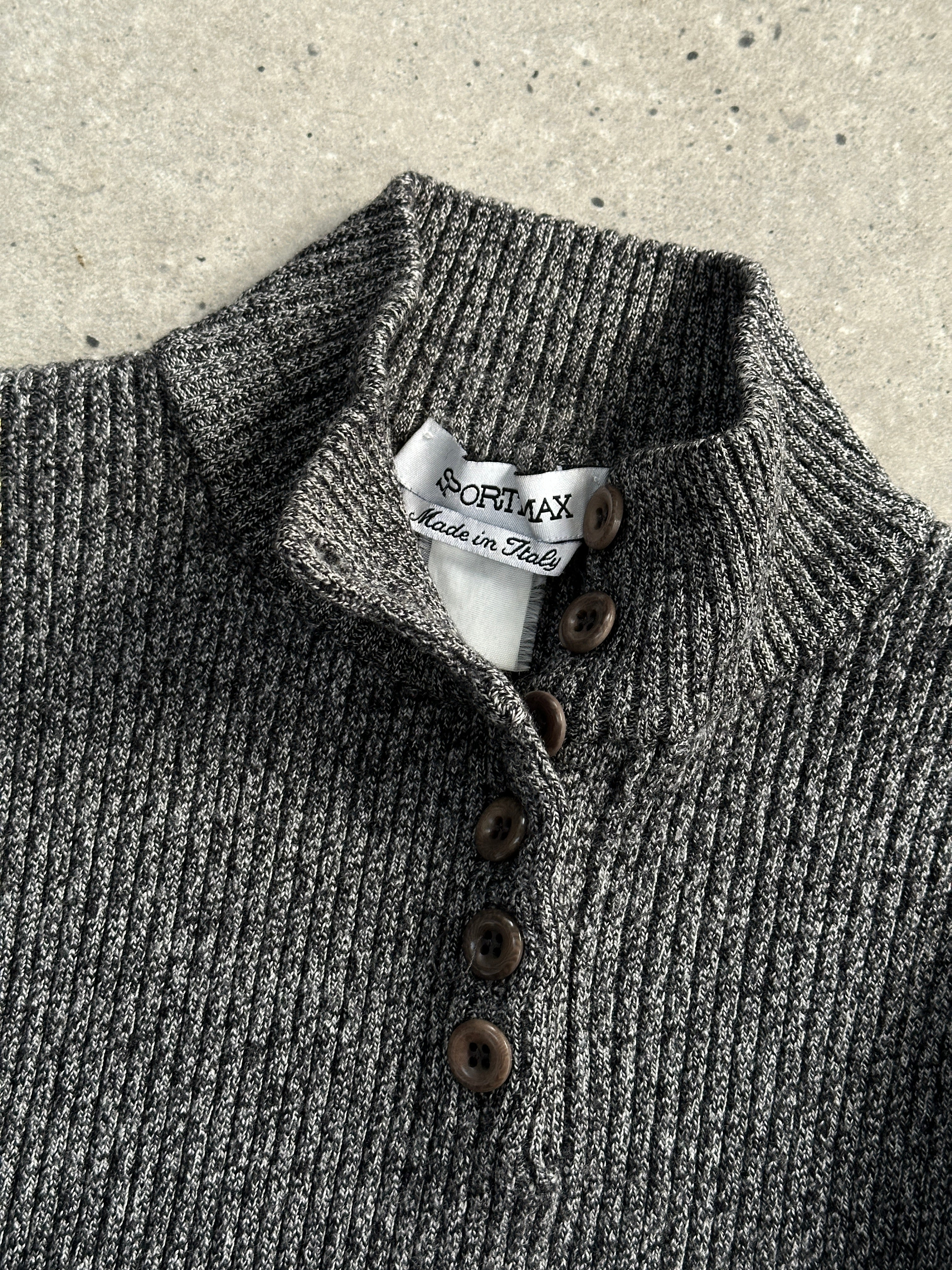Sportmax wool fitted ribbed polo jumper in size S, showcasing a stylish, close-fitting design with ribbed texture and classic polo collar.