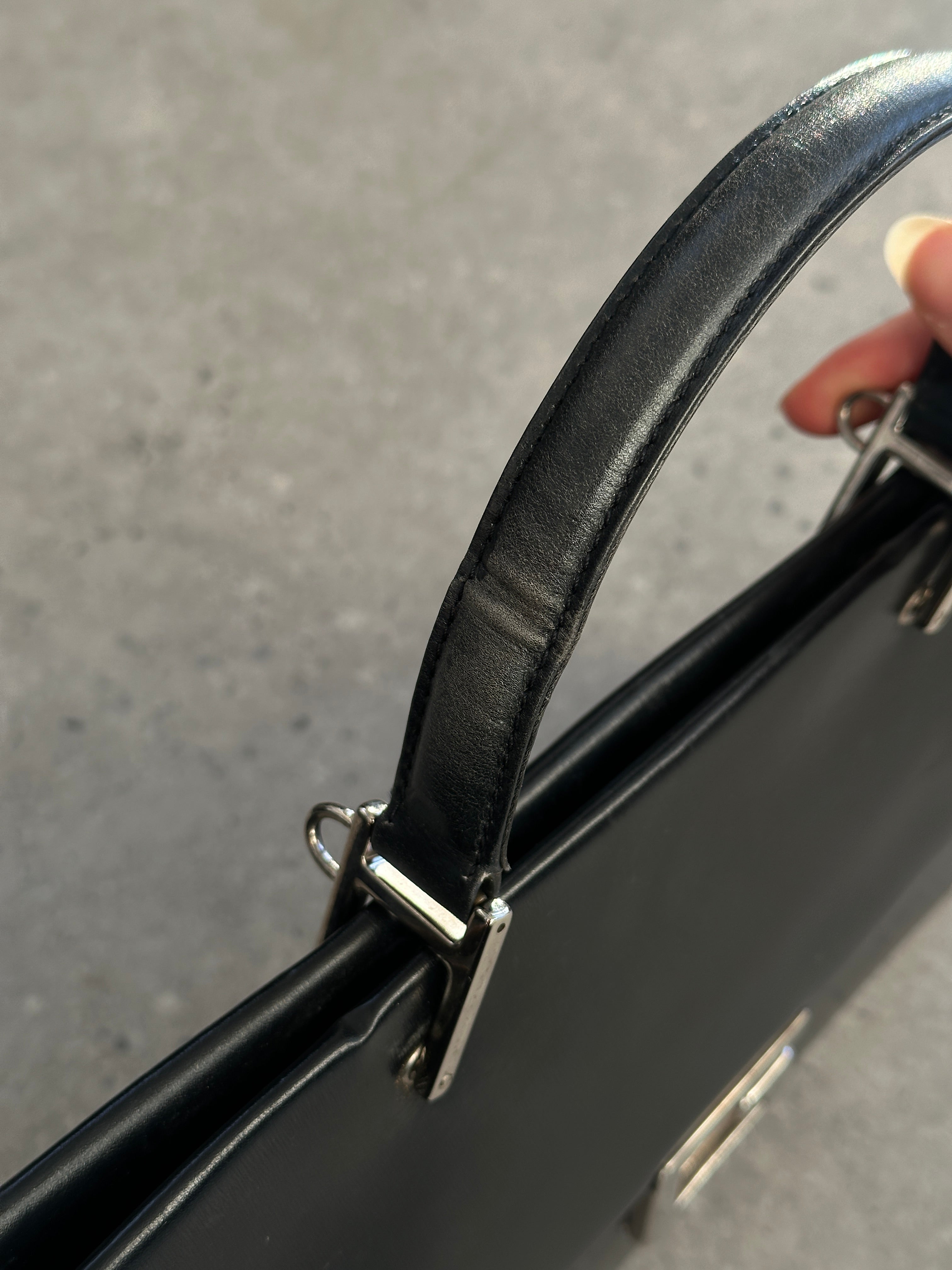 Gucci 1990s Tom Ford Square G leather handbag with structured shape and gold-tone hardware, featuring signature Gucci design elements.