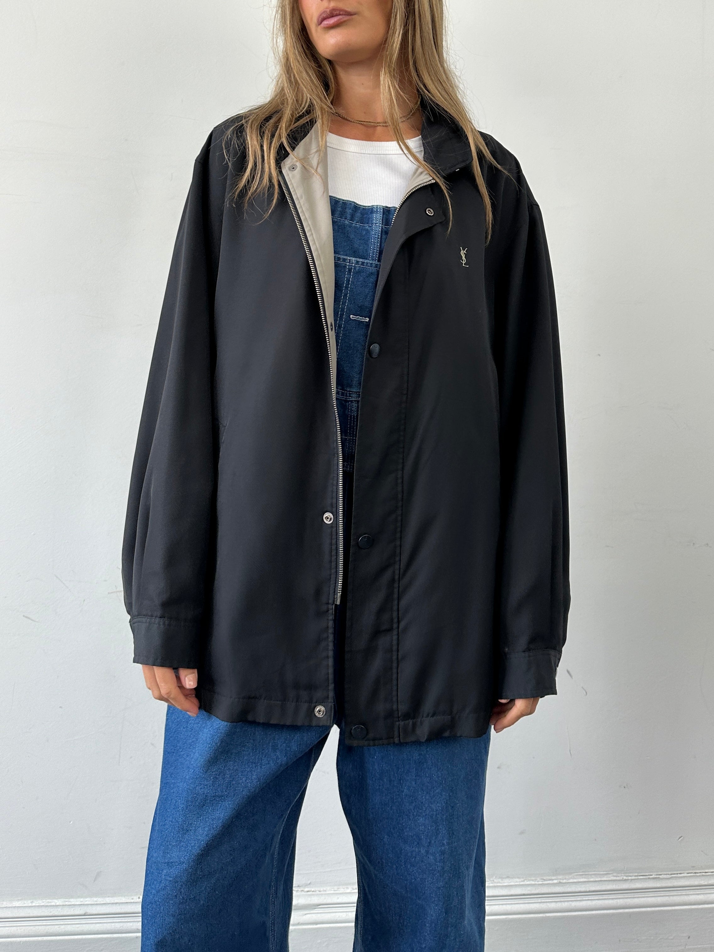 Yves Saint Laurent Pour Homme showerproof logo bomber jacket in XL/XXL, black with YSL branding and zip closure.