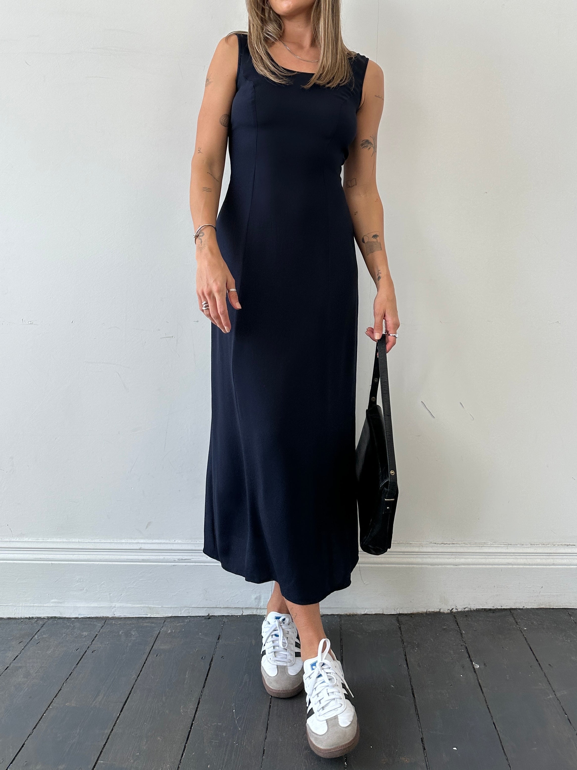 Elegant Laura Ashley floor-length dress in UK size 10, featuring a flowing design and classic style.