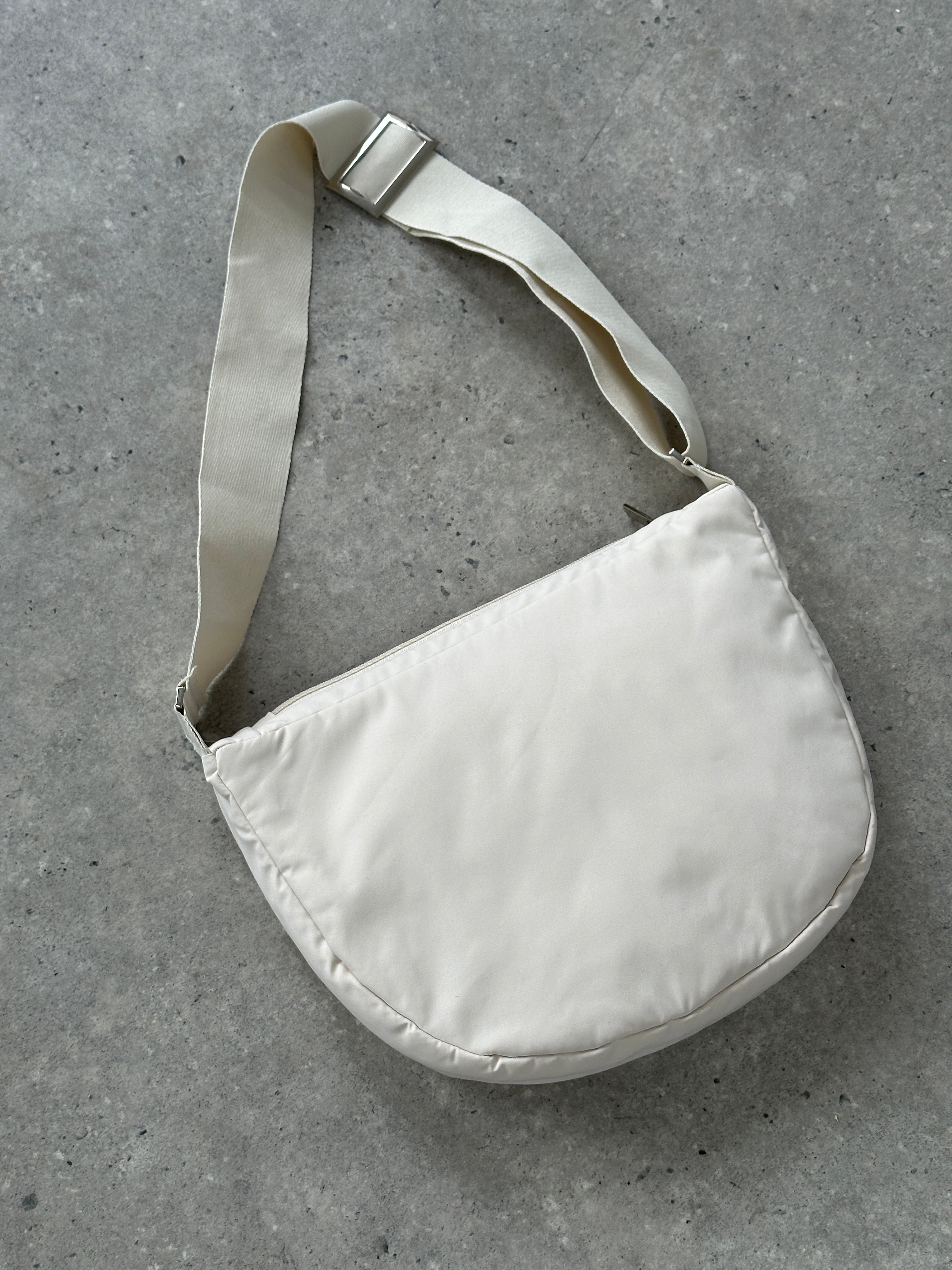 Vintage waterproof round crossbody bag with adjustable strap and retro design, perfect for casual outings.