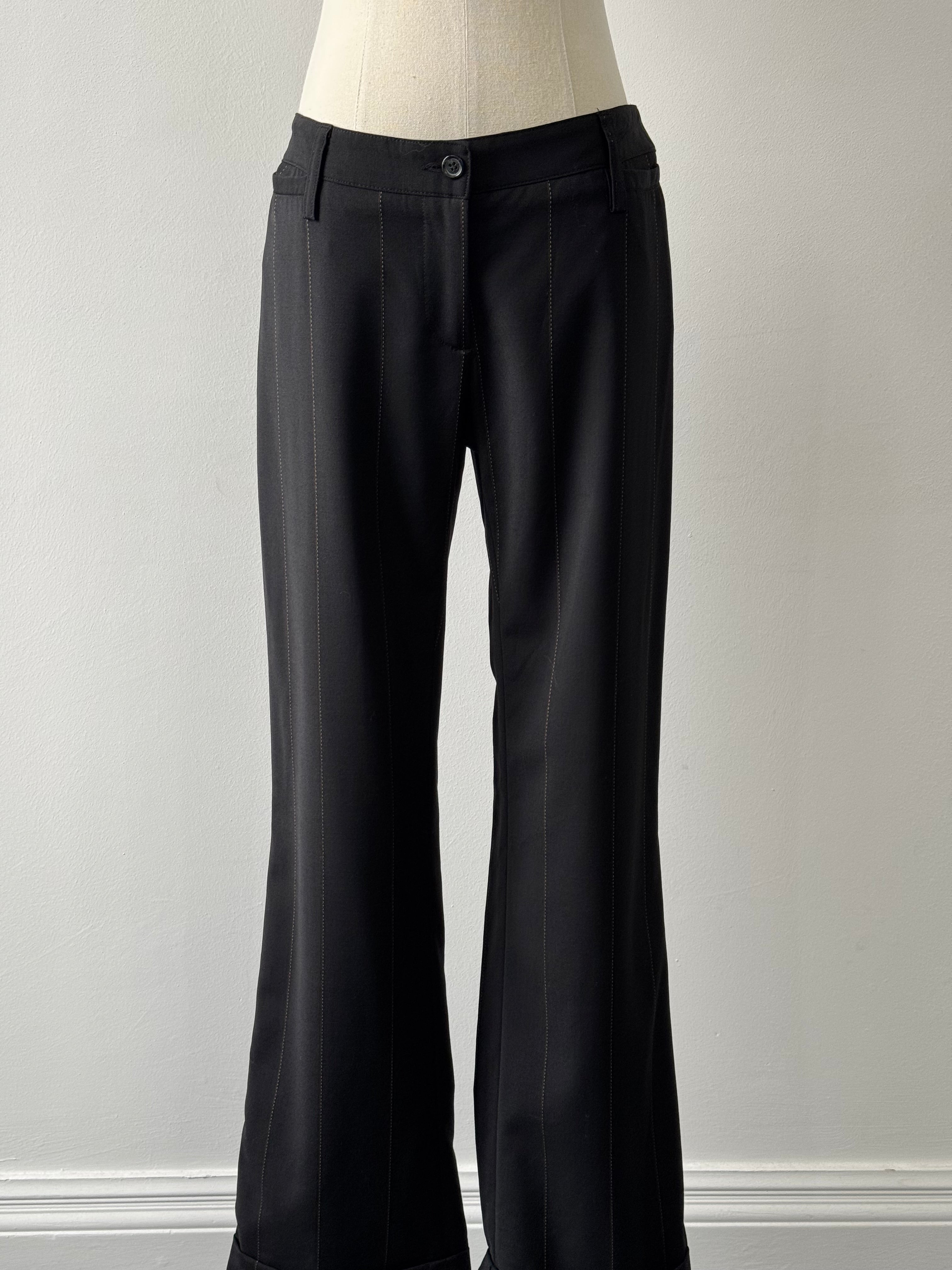 Dolce & Gabbana 2000s wool trousers in dark fabric, front view with classic tailored fit and subtle stitching details.