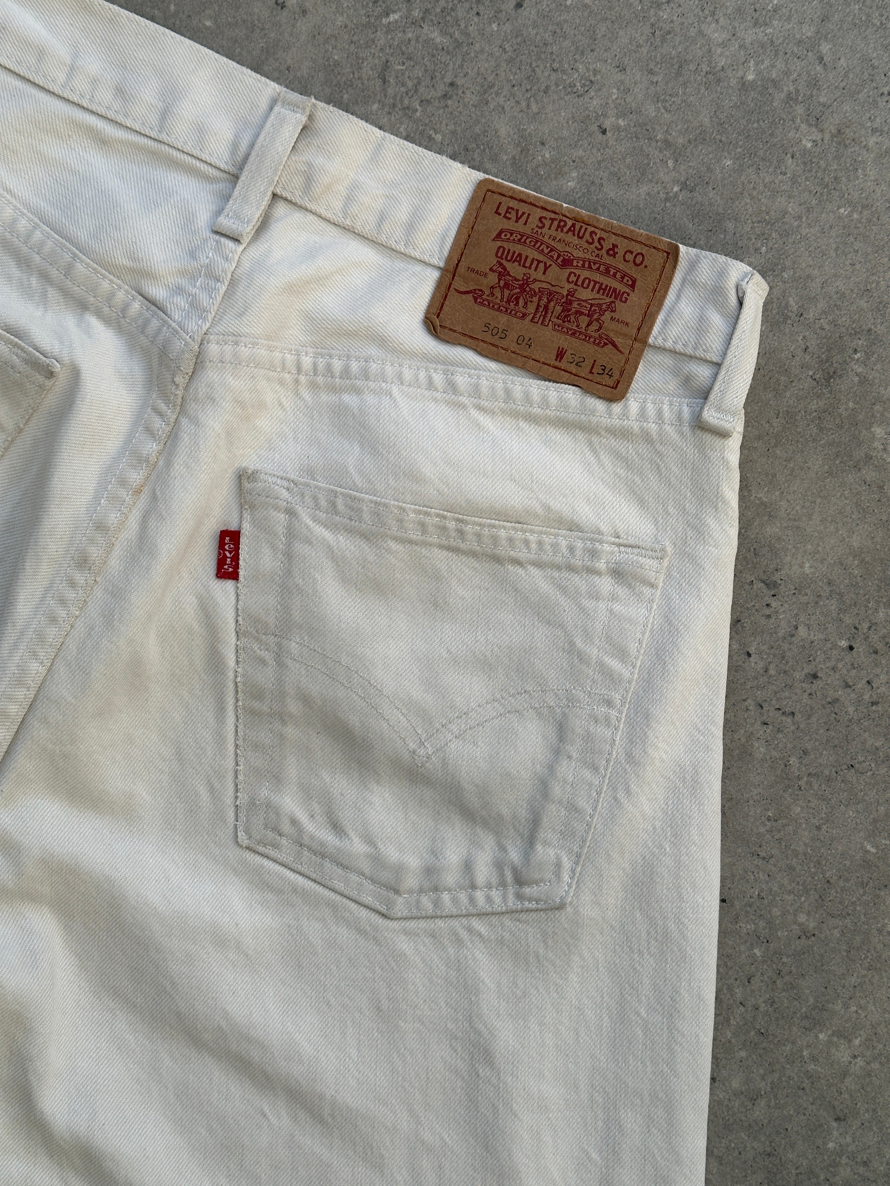 Levi’s 505 Slim Straight Leg Denim Jeans in W30, showing classic blue denim with a zip fly and five-pocket design.