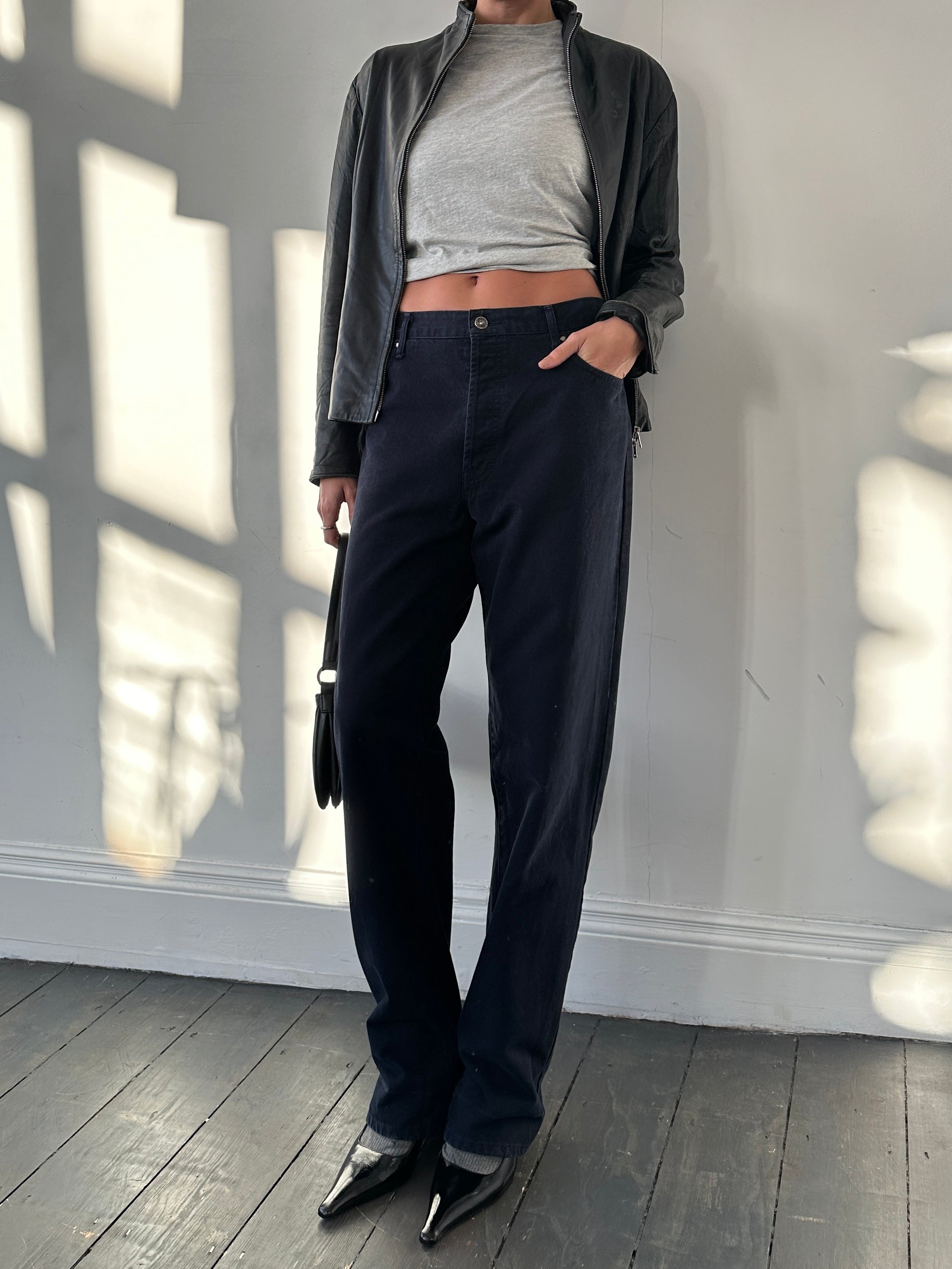 Versace tall pure cotton tapered leg denim jeans in W34, showing front view with classic blue wash and belt loops
