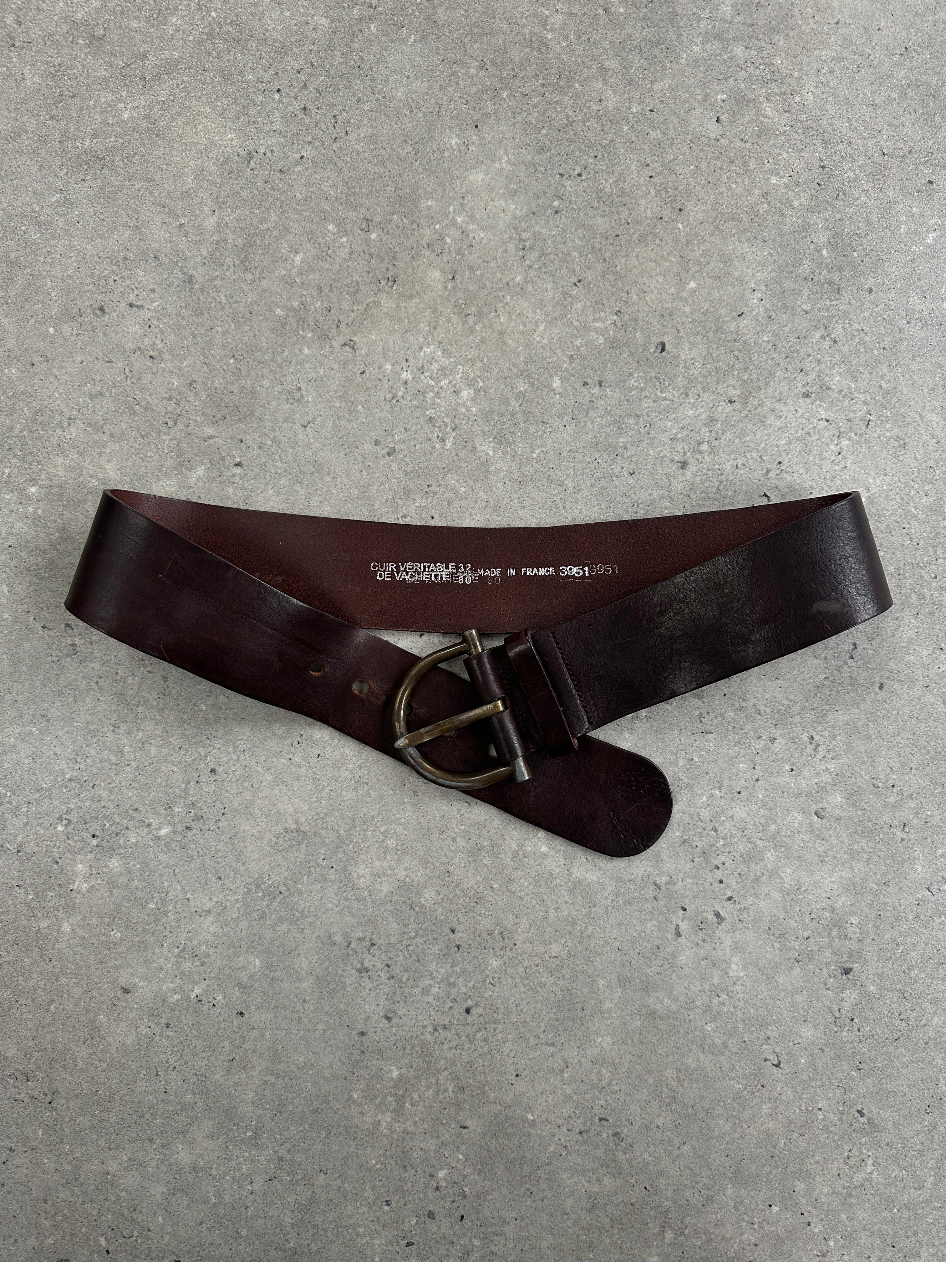 Vintage French 1980s chunky leather belt with brass buckle, adjustable W30-34, classic retro style and sturdy construction.