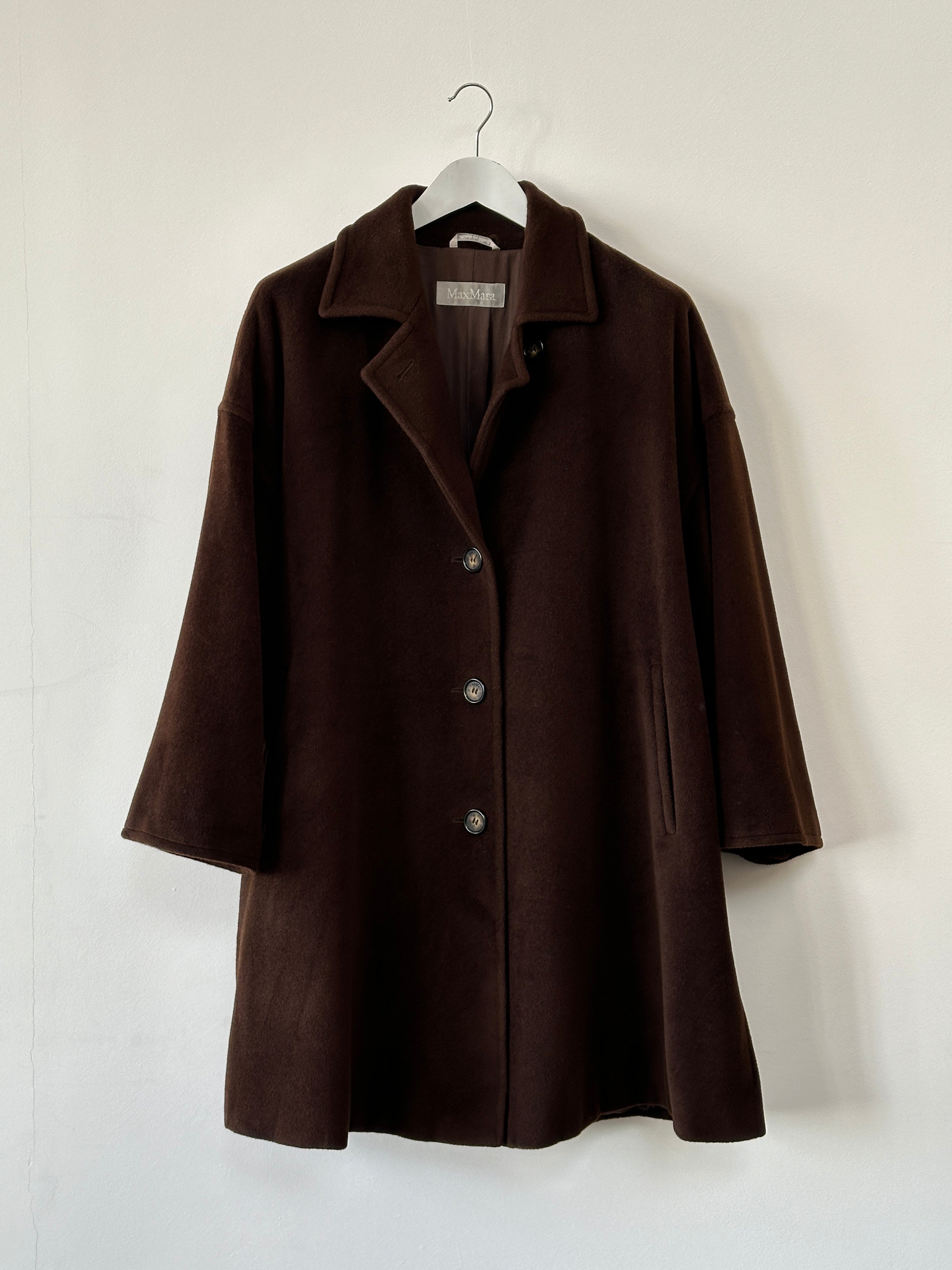 Max Mara pure virgin wool A-line coat in XL, shown in a neutral color with a classic collar and tailored fit.