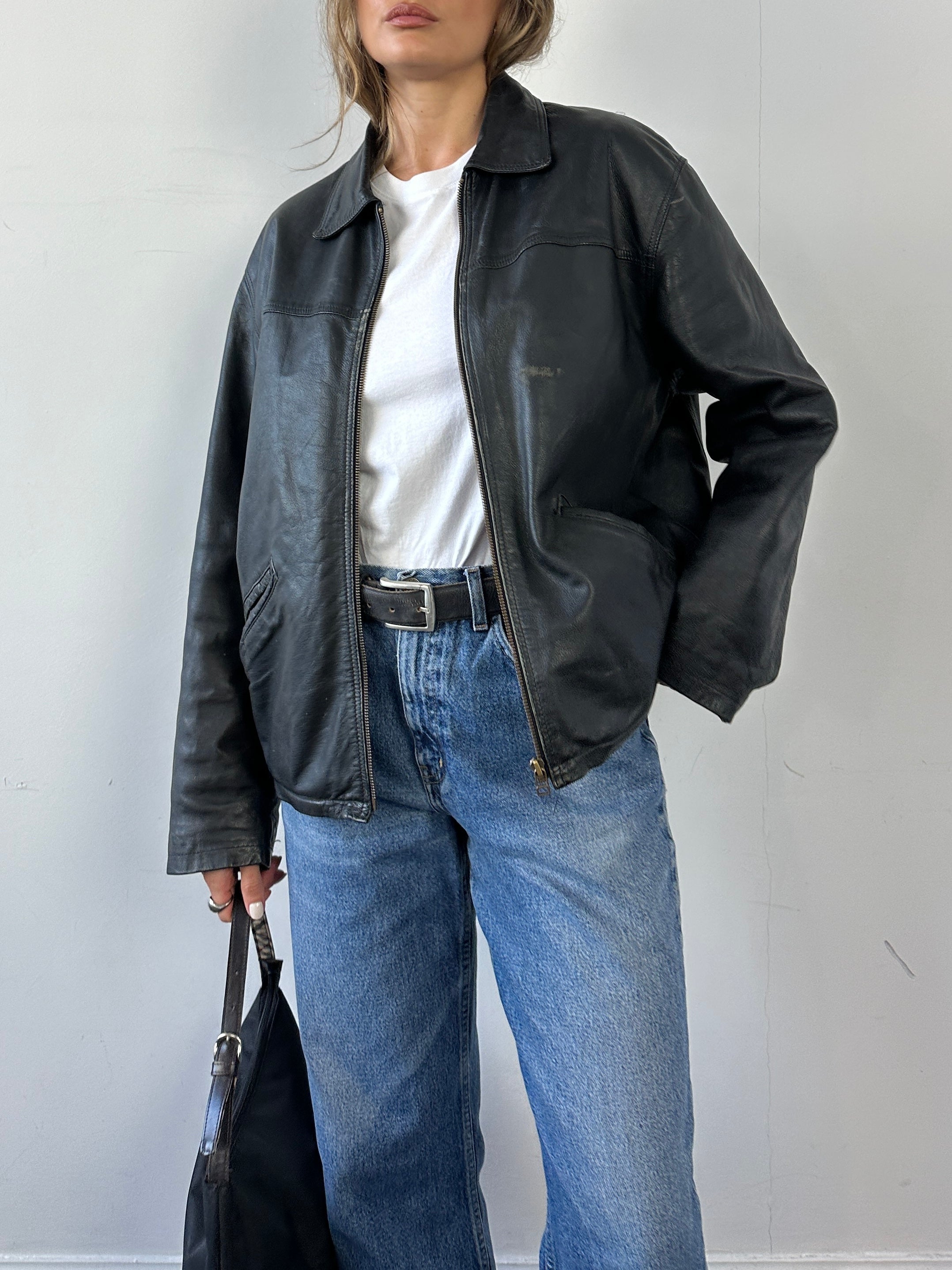 Conbipel distressed leather jacket in size L, featuring a rugged design with distressed leather and stylish details.