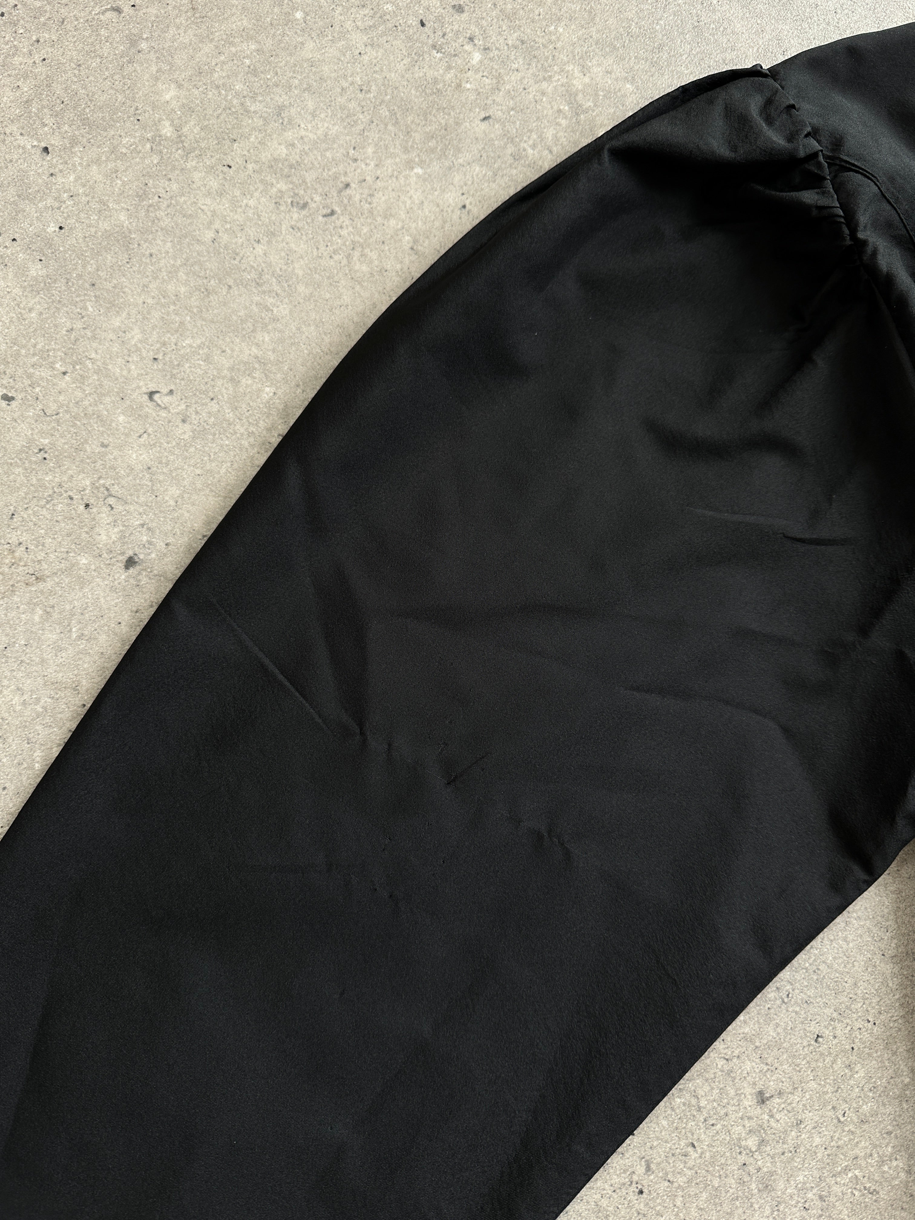 Vintage brand vintage puff sleeve pleated shirt in size M, featuring a classic design with puffed sleeves and front pleats.