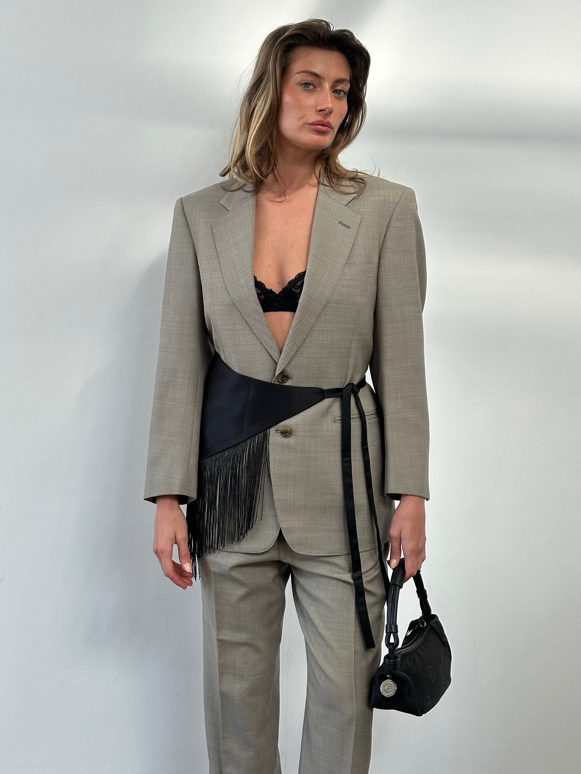 Burberry 1990s pure wool single-breasted suit in navy, featuring classic lapels and tailored fit, displayed on a hanger.