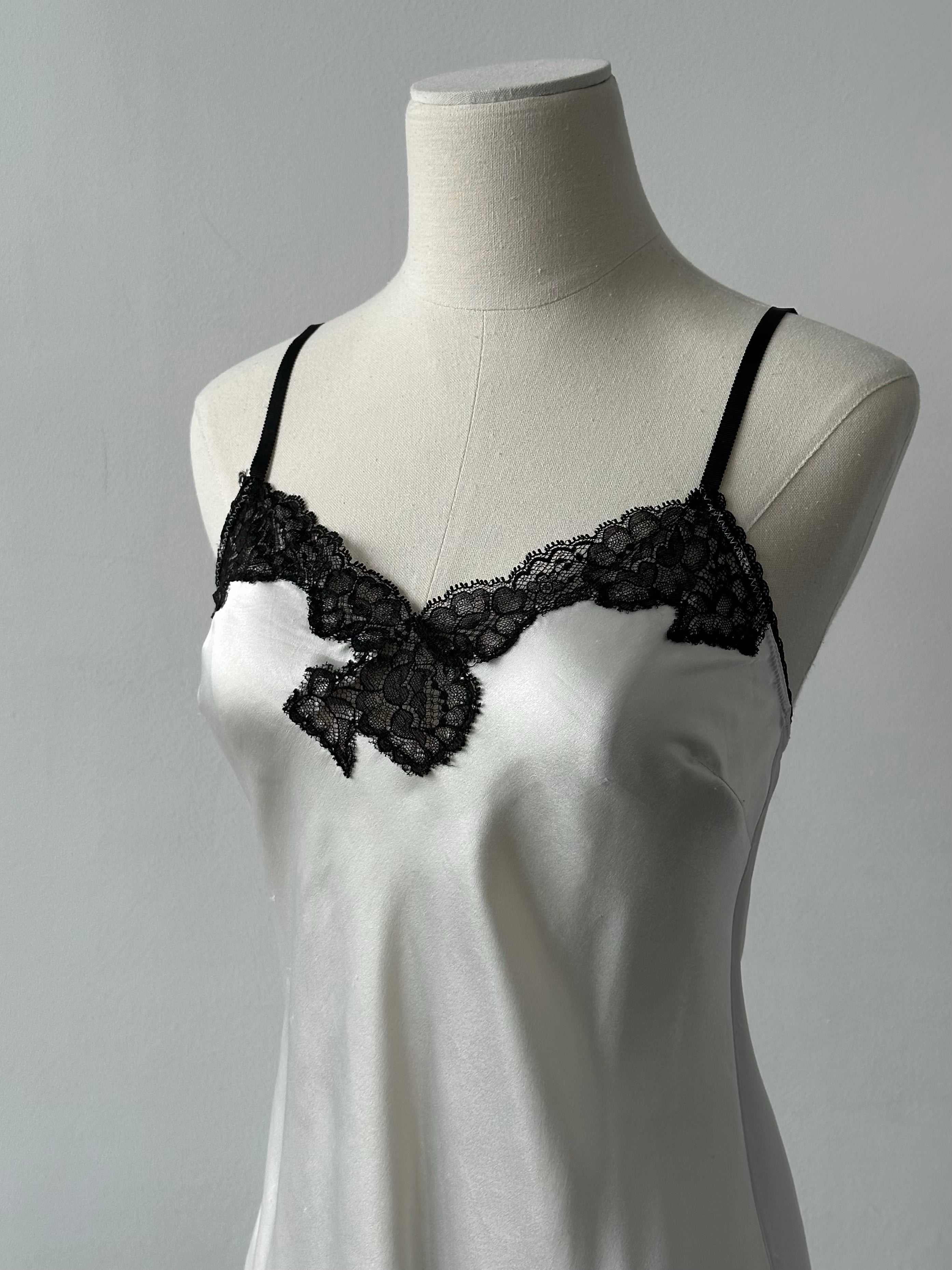Victoria's Secret 2000s satin lace mini slip dress in XS/S, featuring silky fabric and delicate lace details.