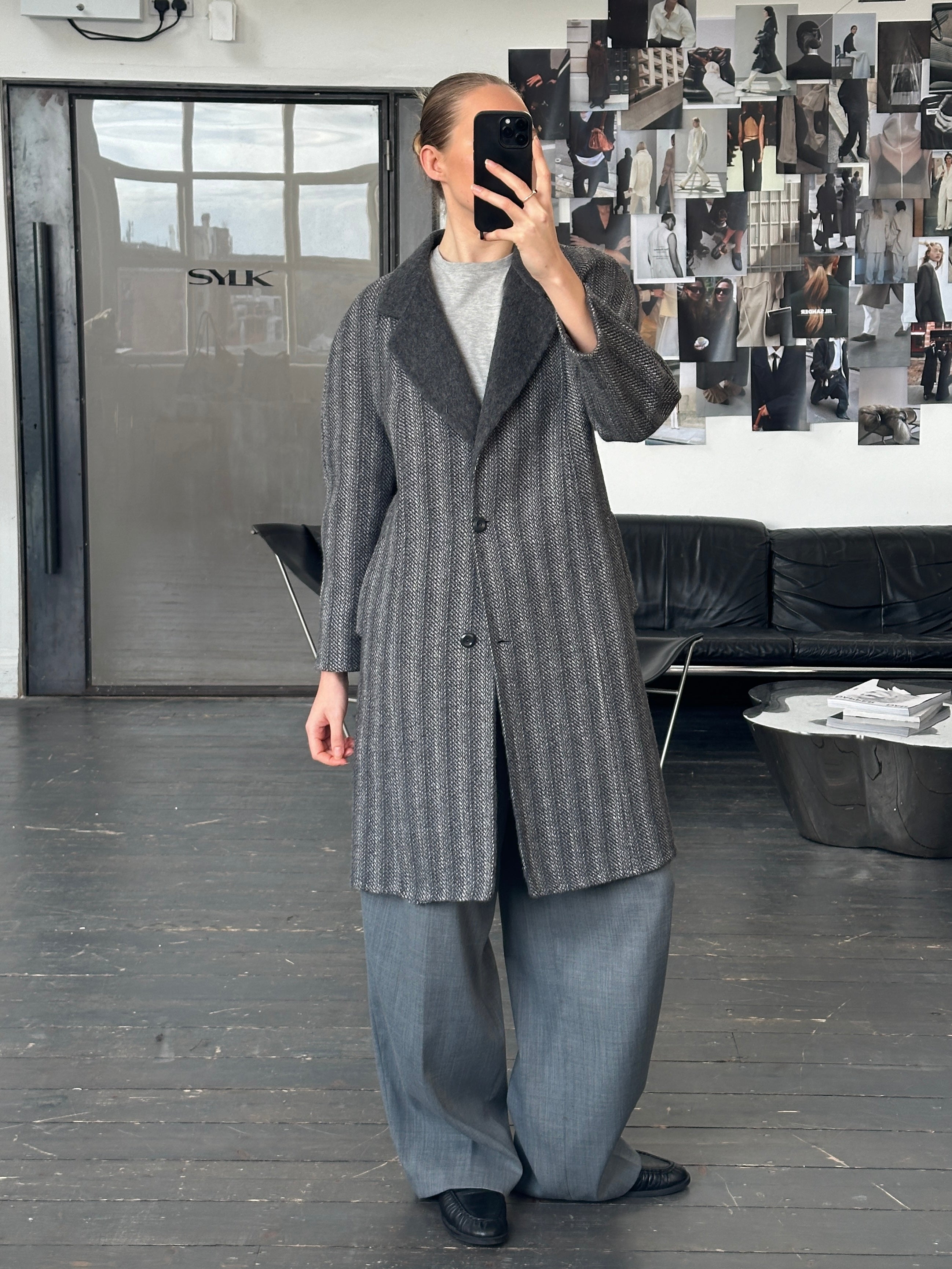 Marina Rinaldi 1990s pure wool double-faced single-breasted coat in size S, shown hanging on a wooden coat rack.