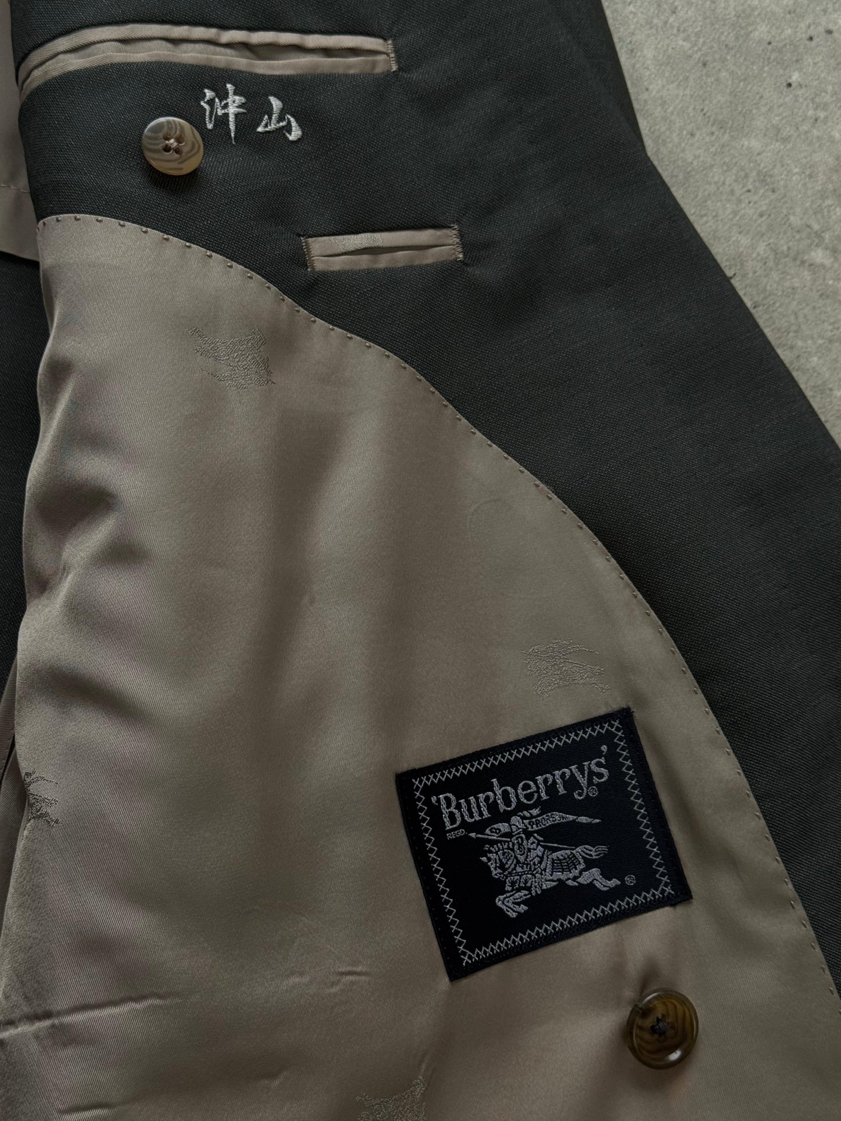 Burberry 1990s wool mohair double-breasted blazer in XL, showcasing classic tailored design with plaid pattern and structured fit.