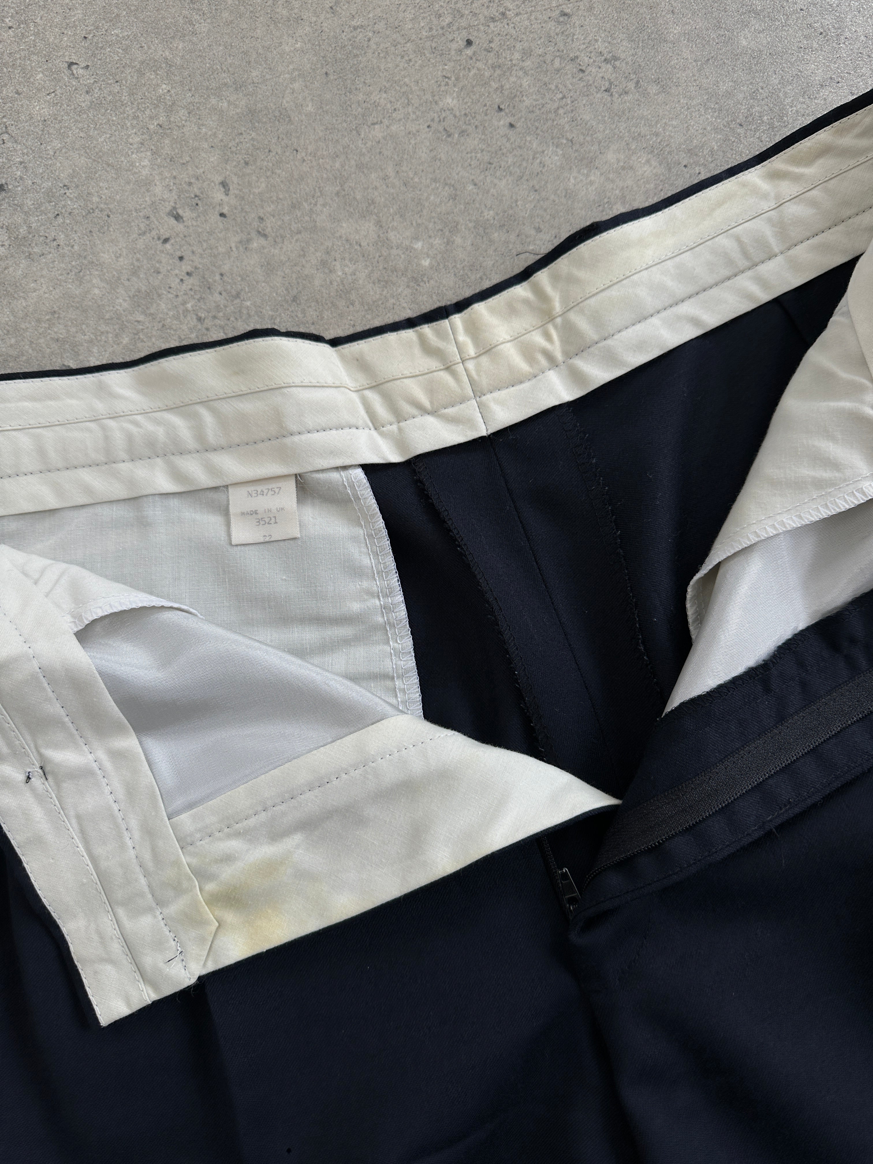Vintage pure wool tailored trousers in straight leg style, size W32, shown in a classic, timeless design with a smooth fabric finish.