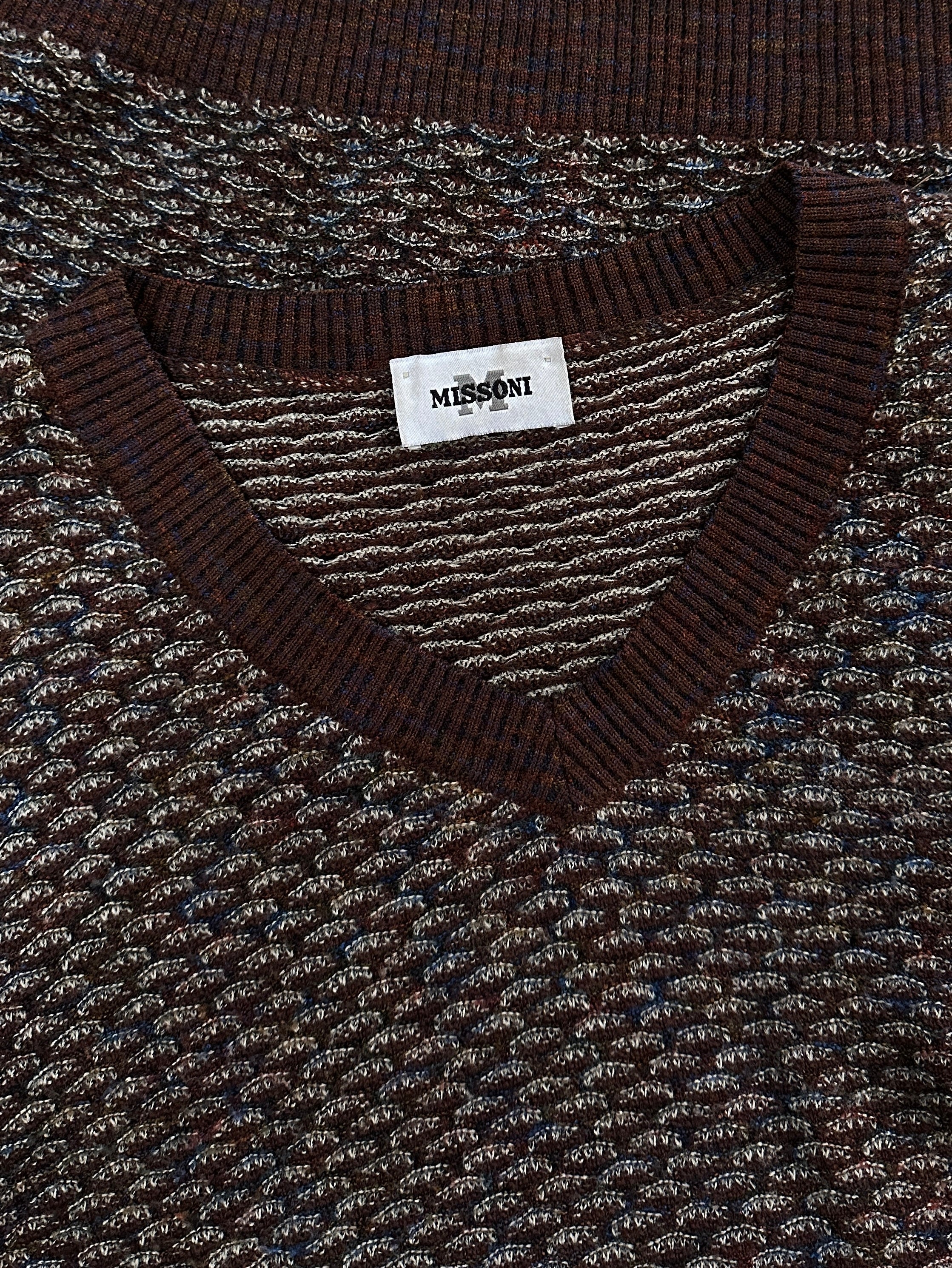 Missoni V neck wool knitted jumper in size L, featuring colorful striped pattern and cozy knit texture.