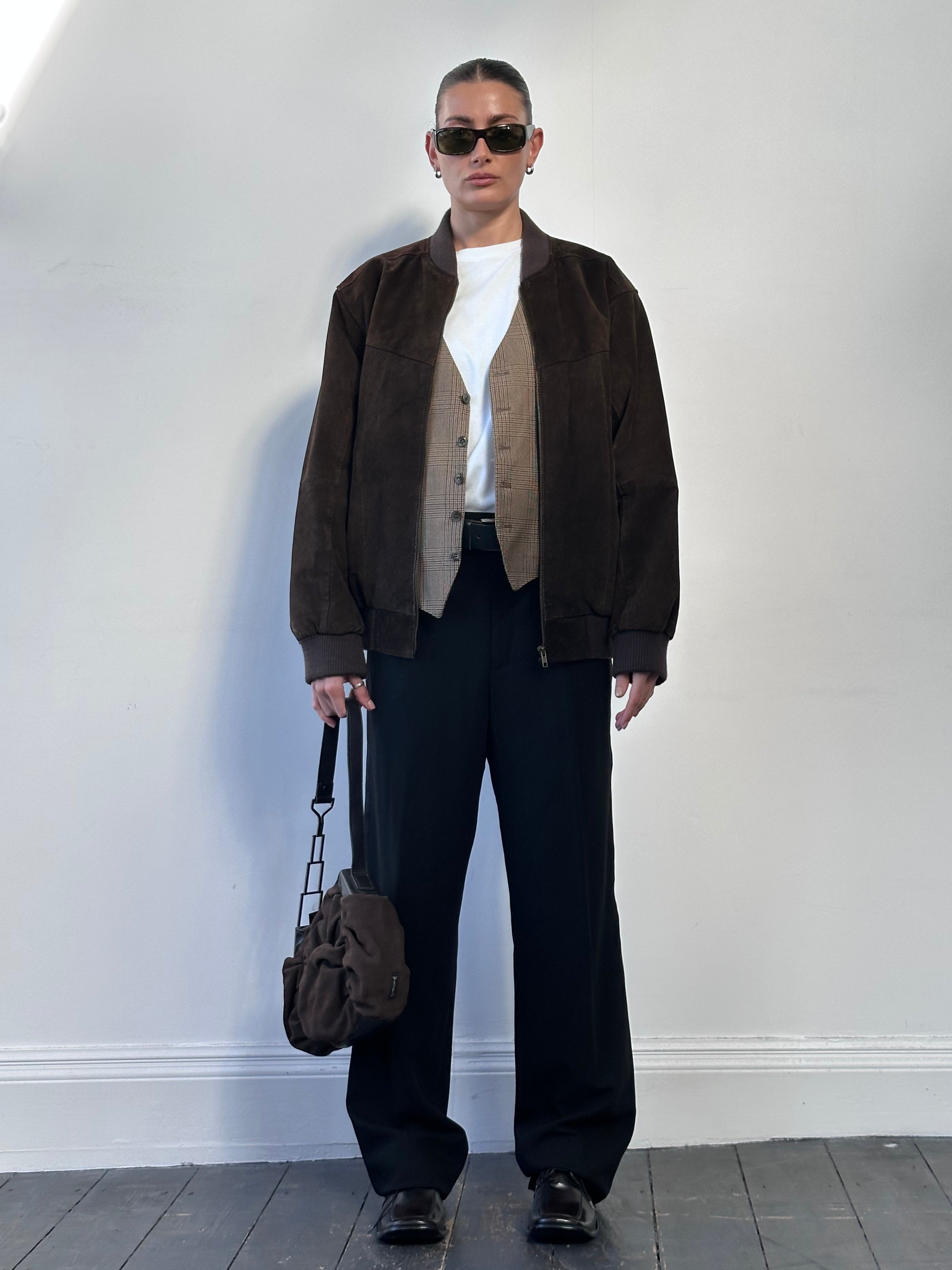 Vintage suede bomber leather jacket in size L, stylish retro design with classic collar and zip front, lightweight and comfortable.