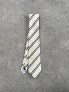 Vintage 2000s Japanese pure silk diagonal stripe tie with classic pattern, ideal for formal or stylish occasions.