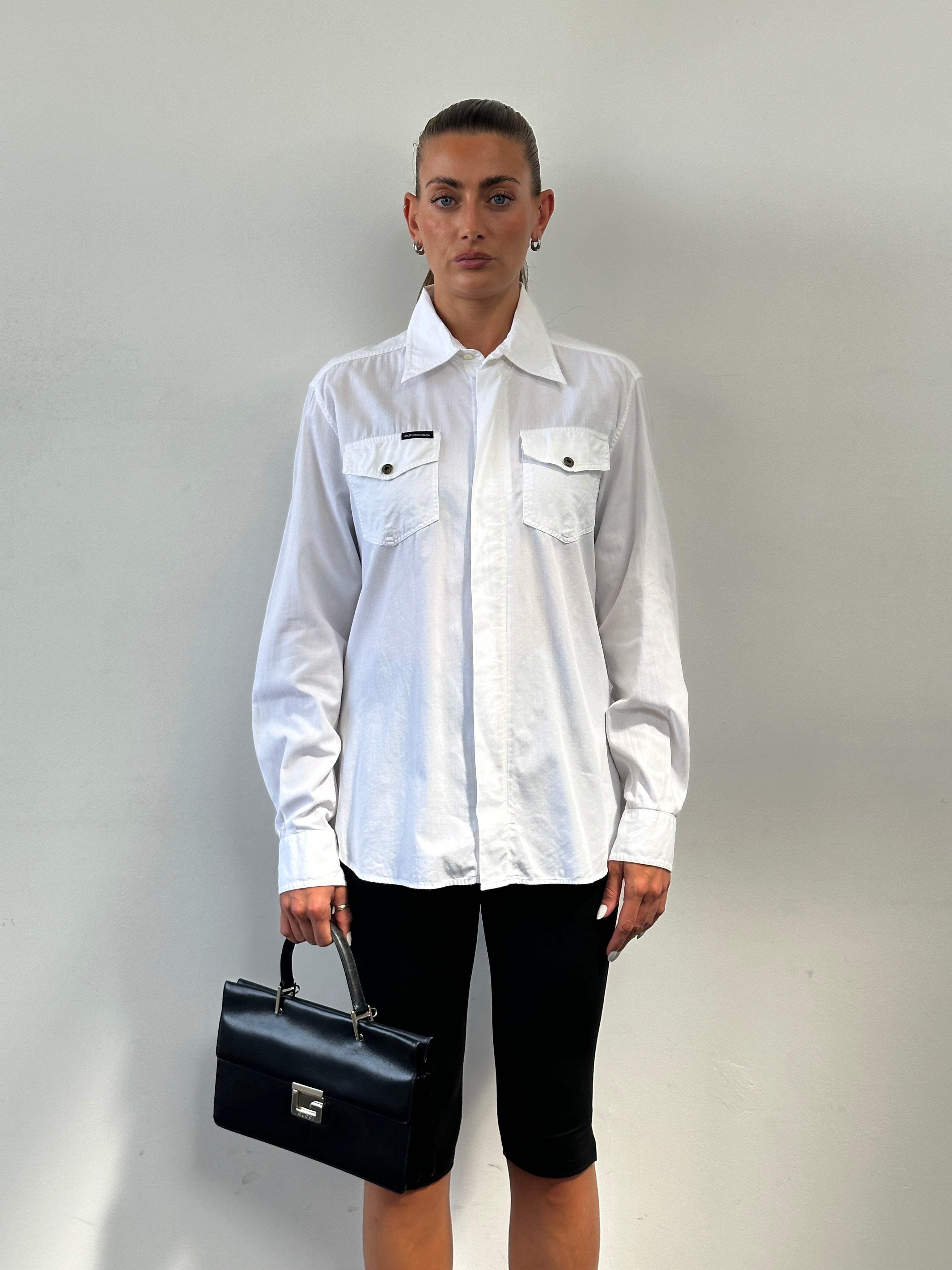 Dolce & Gabbana cotton shirt in size M/L featuring a classic design and white fabric, displayed on a hanger.