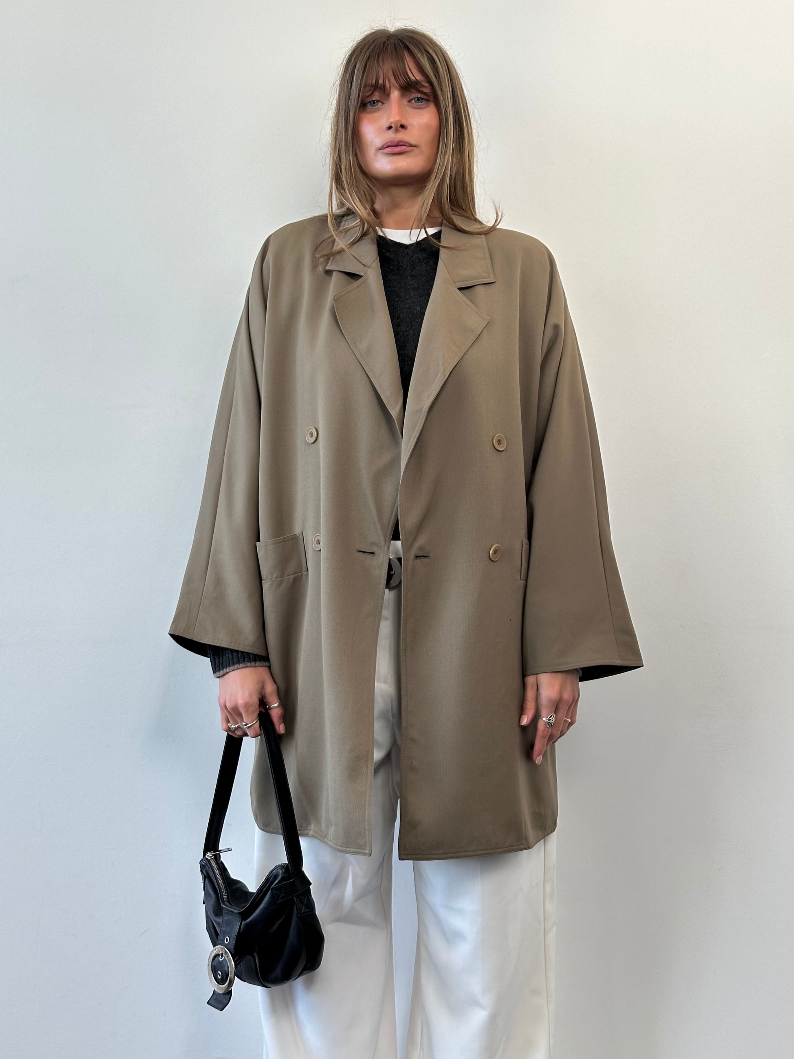 Marella pure wool double-breasted trench coat in size L/XL, featuring a classic design and belt, displayed on a hanger.