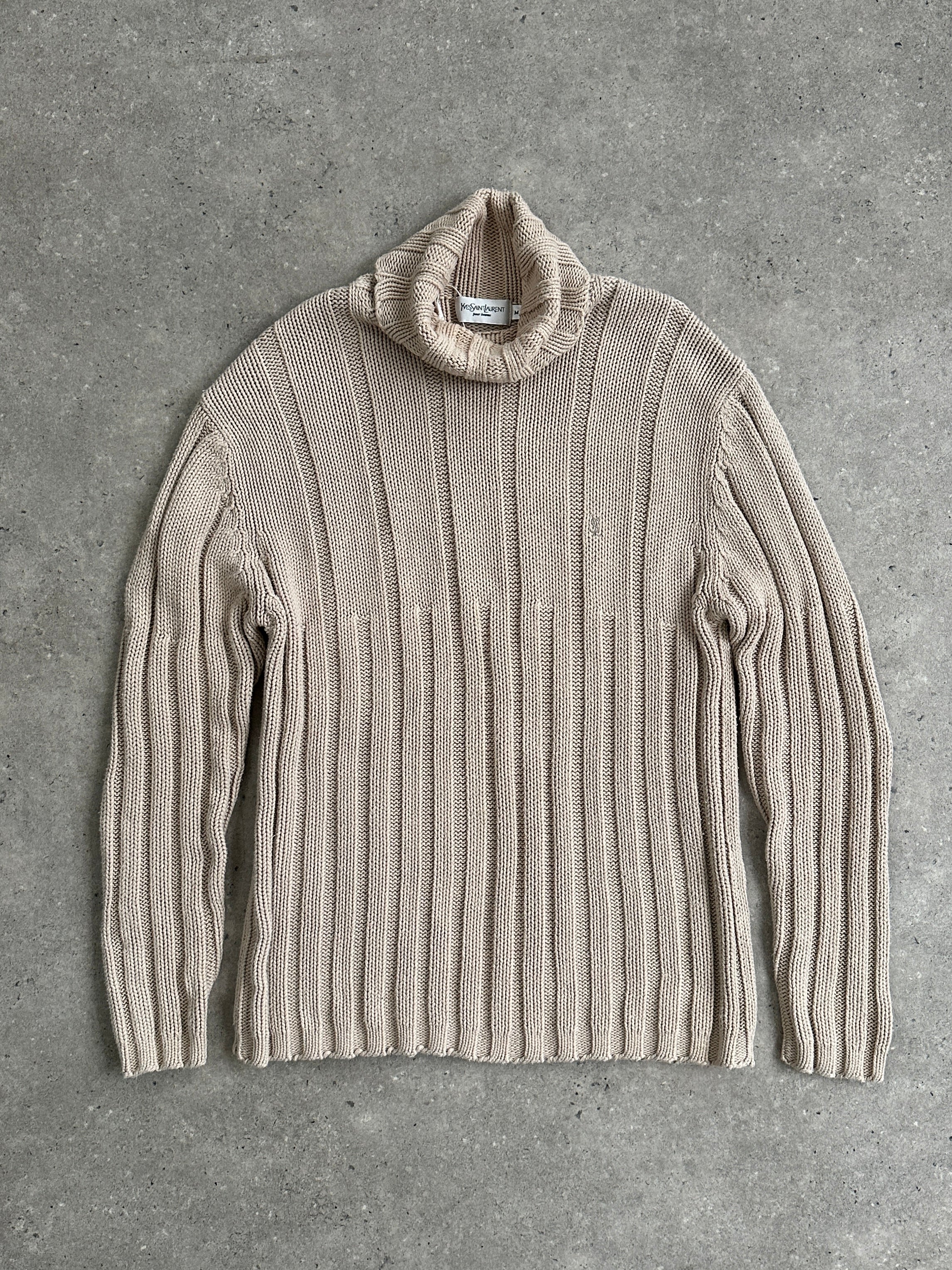 Yves Saint Laurent Pour Homme pure cotton logo roll neck jumper in size L displayed on a hanger.