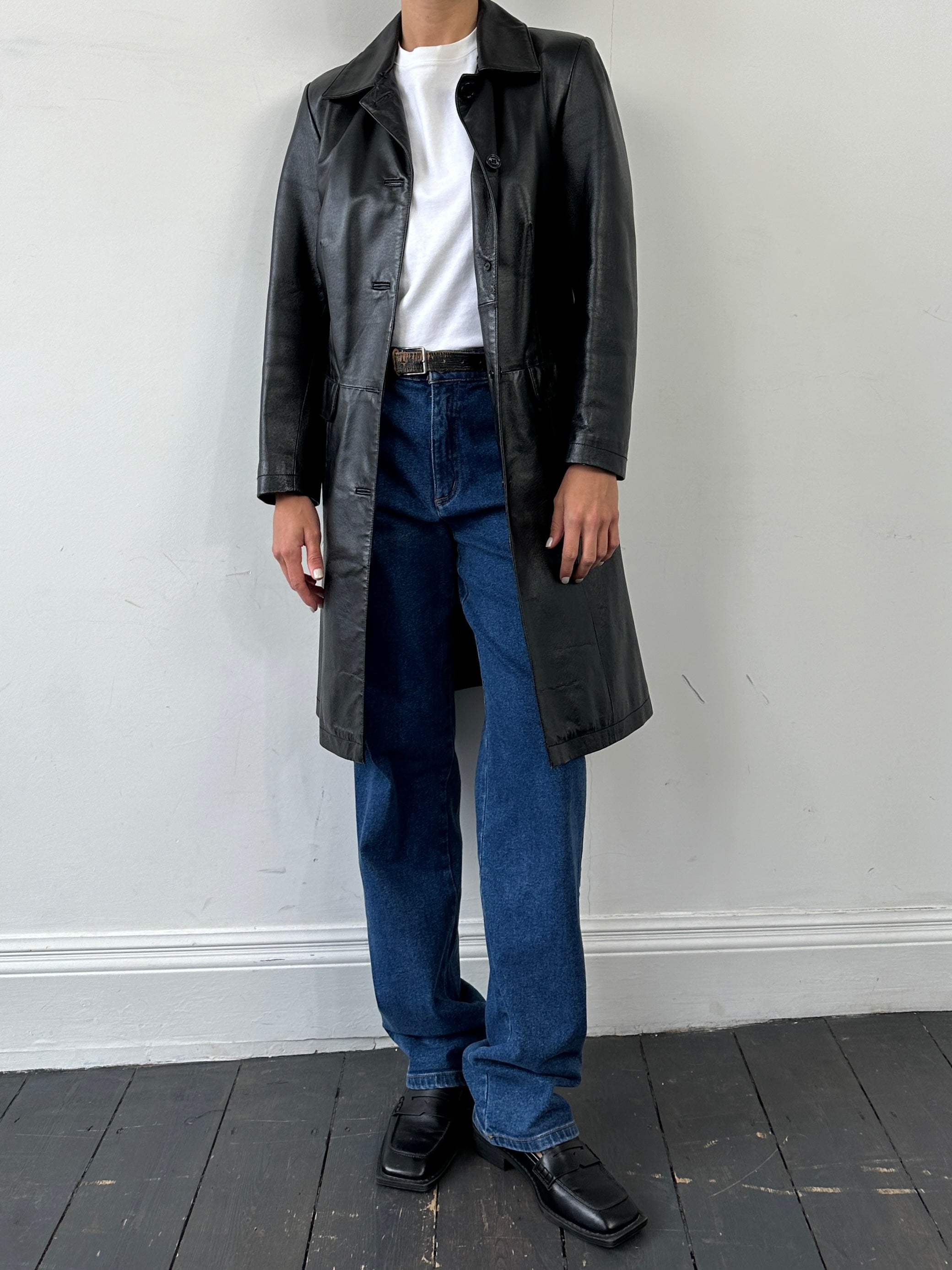 Vintage Italian leather trench coat, single-breasted style in size small, classic vintage coat with detailed leather craftsmanship.