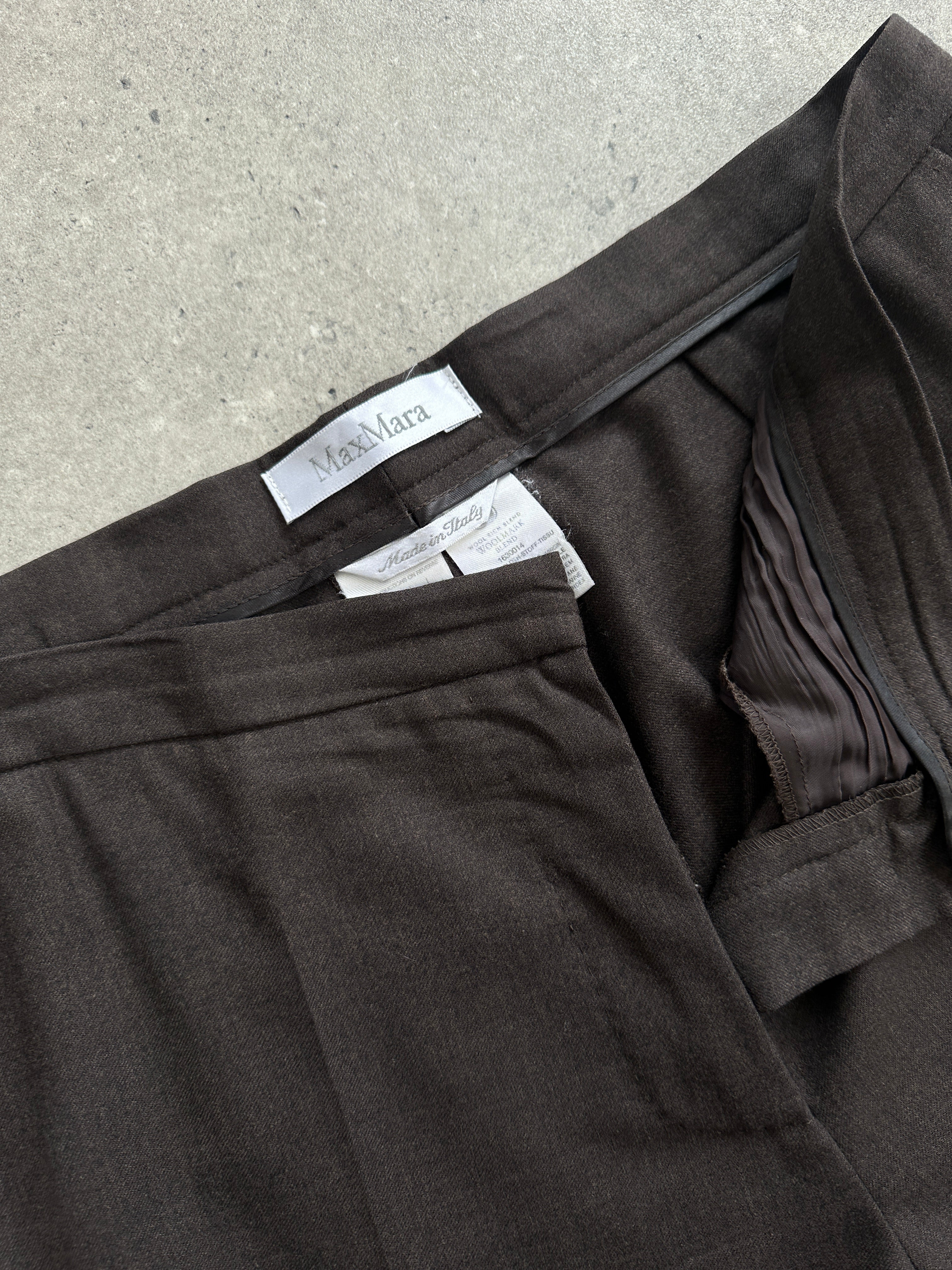 Max Mara virgin wool straight leg mid waist trousers in W32, shown in a neutral color with a tailored fit.
