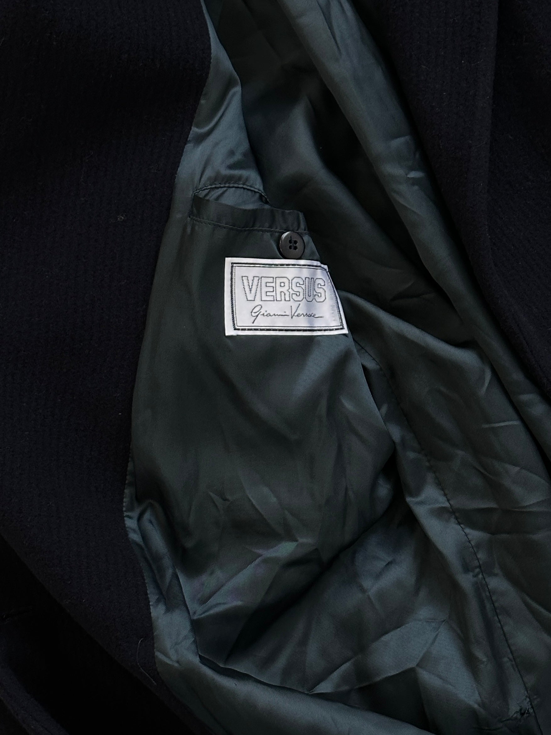 Versace wool cashmere double-breasted coat in XL, featuring classic lapels and tailored fit, displayed on a neutral background.