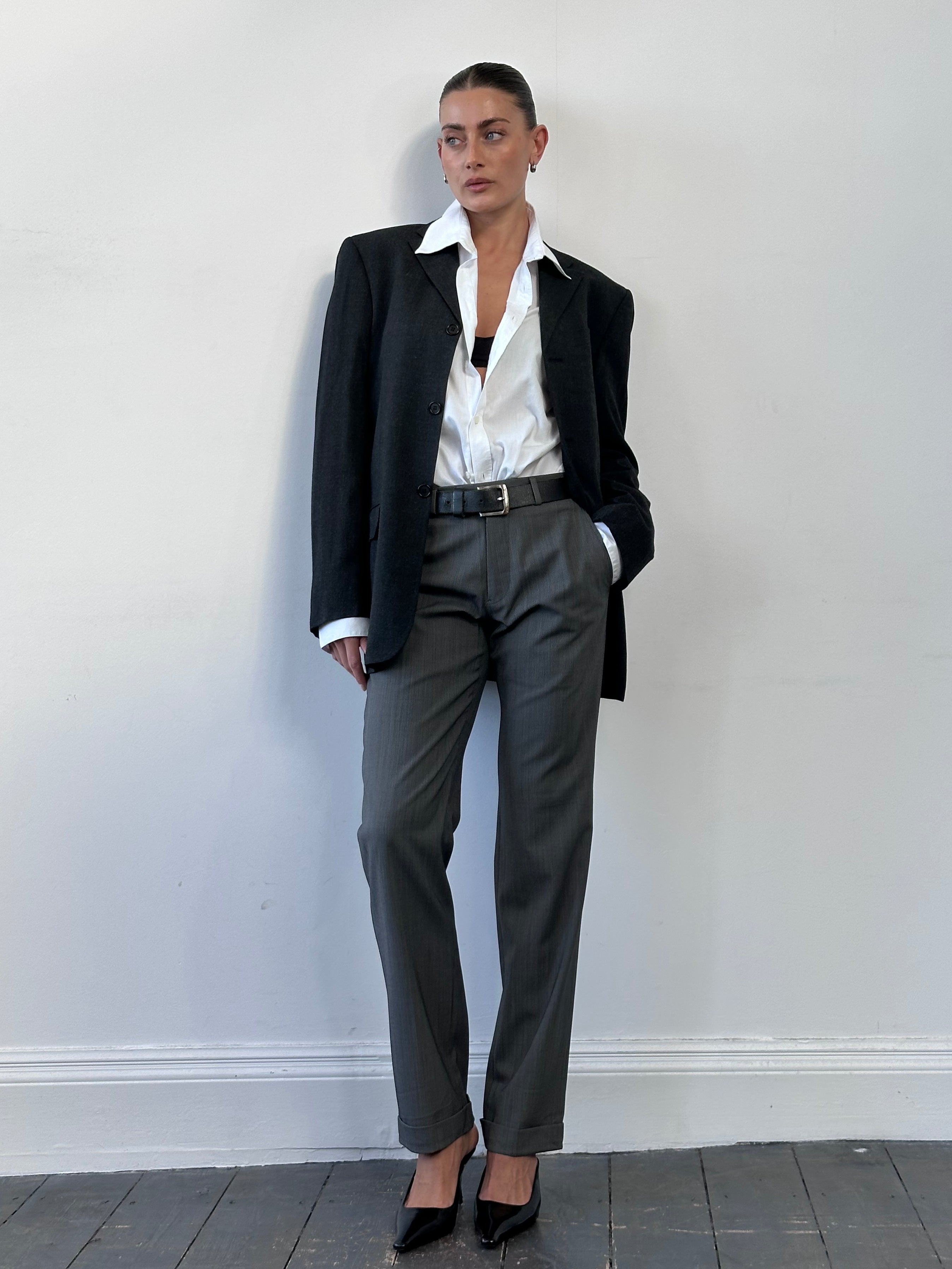 Valentino wool single-breasted blazer in size 36R/M, classic tailored fit, dark gray with notch lapel and front button closure.