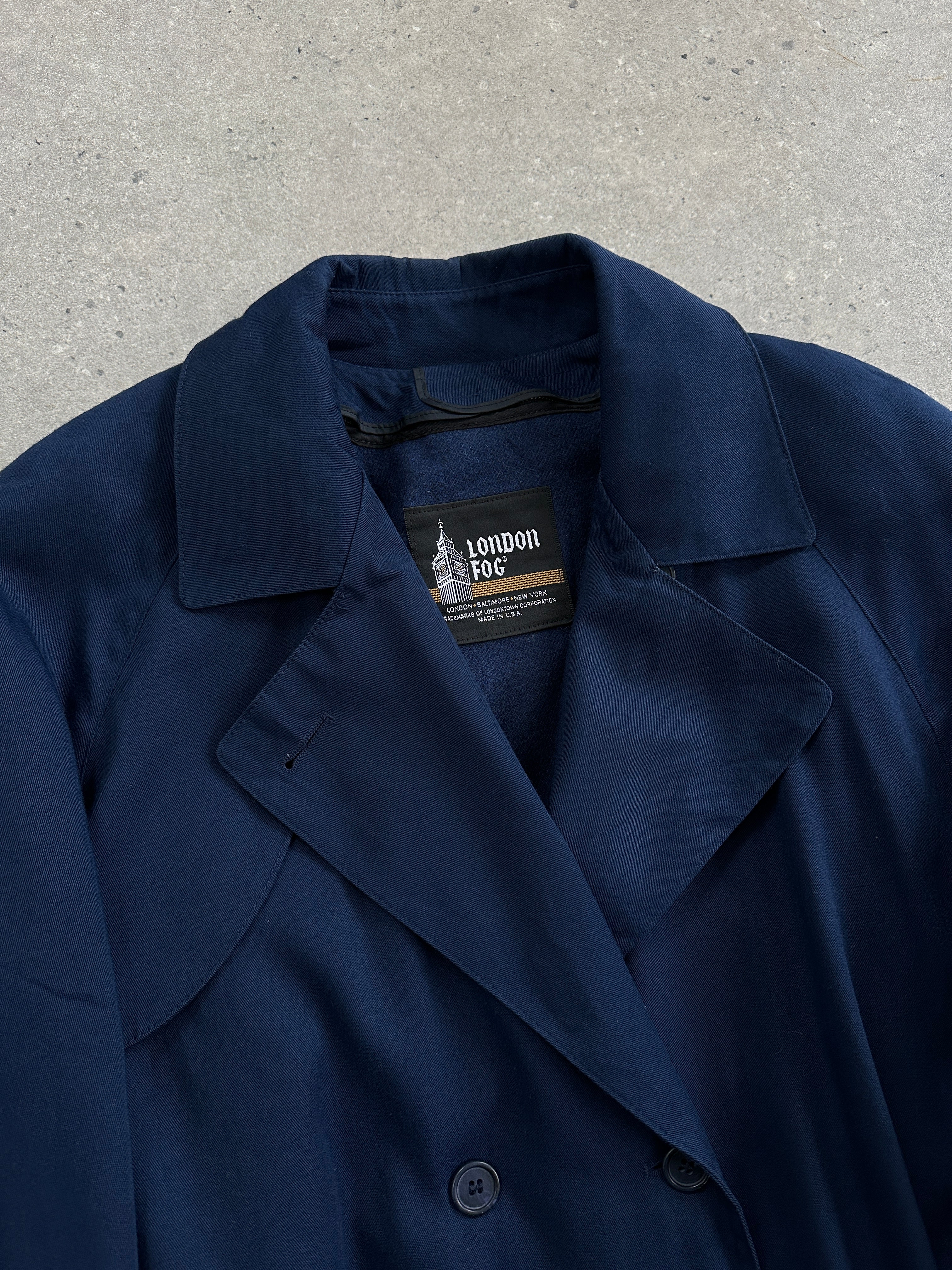 London Fog wool belted trench coat in XL size, featuring classic double-breasted design and neutral color for stylish outerwear.