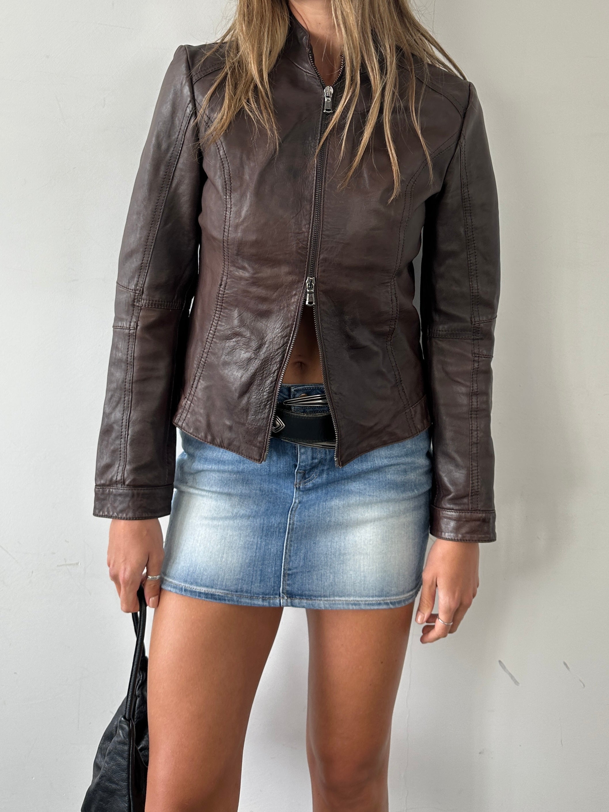 Vintage Italian double zip biker leather jacket, slim fit men's style with classic design and detailed stitching.