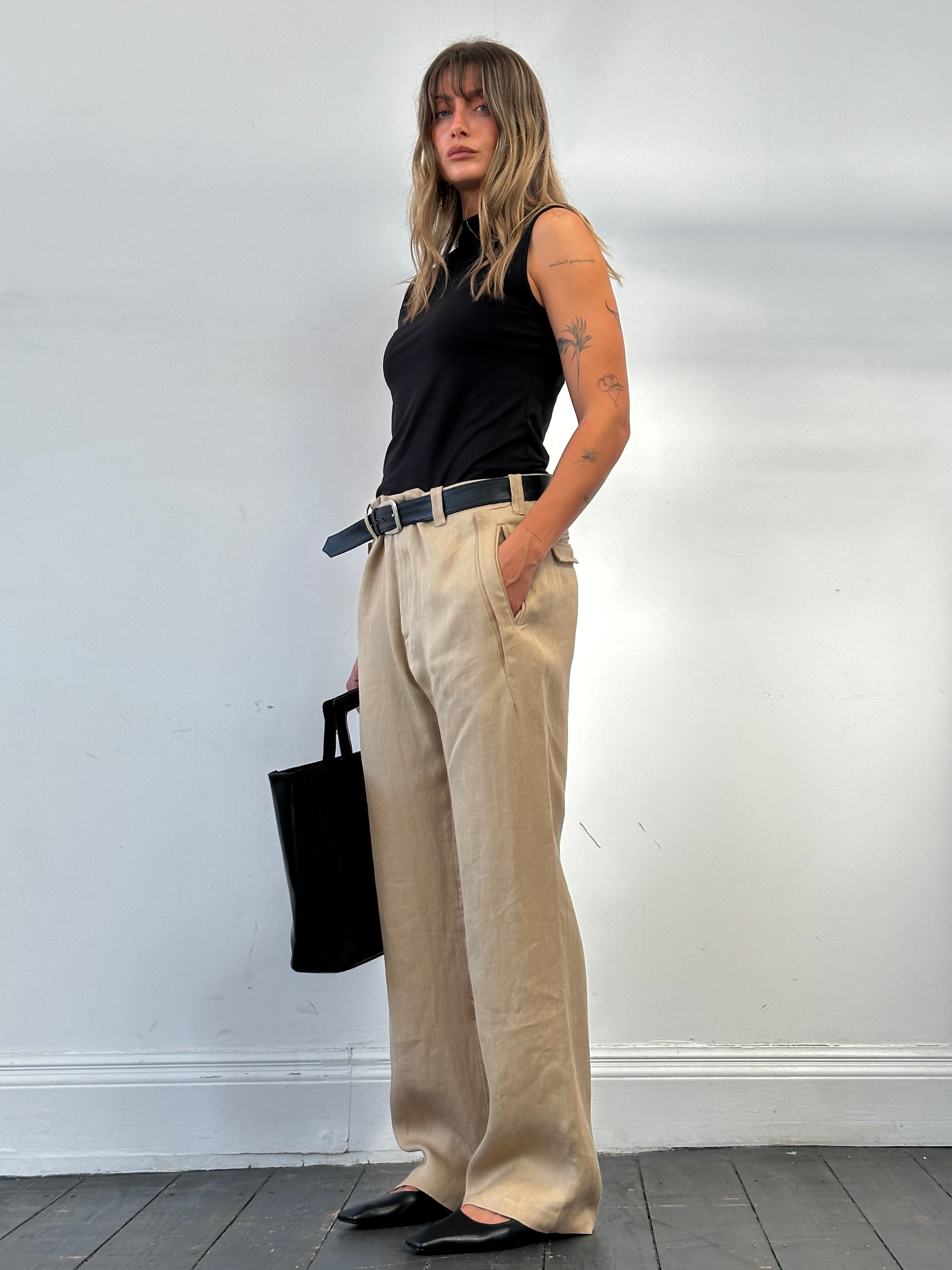 Versace 1990s pure ramie wide-leg trousers in size W34, beige color, with high waist and relaxed fit.